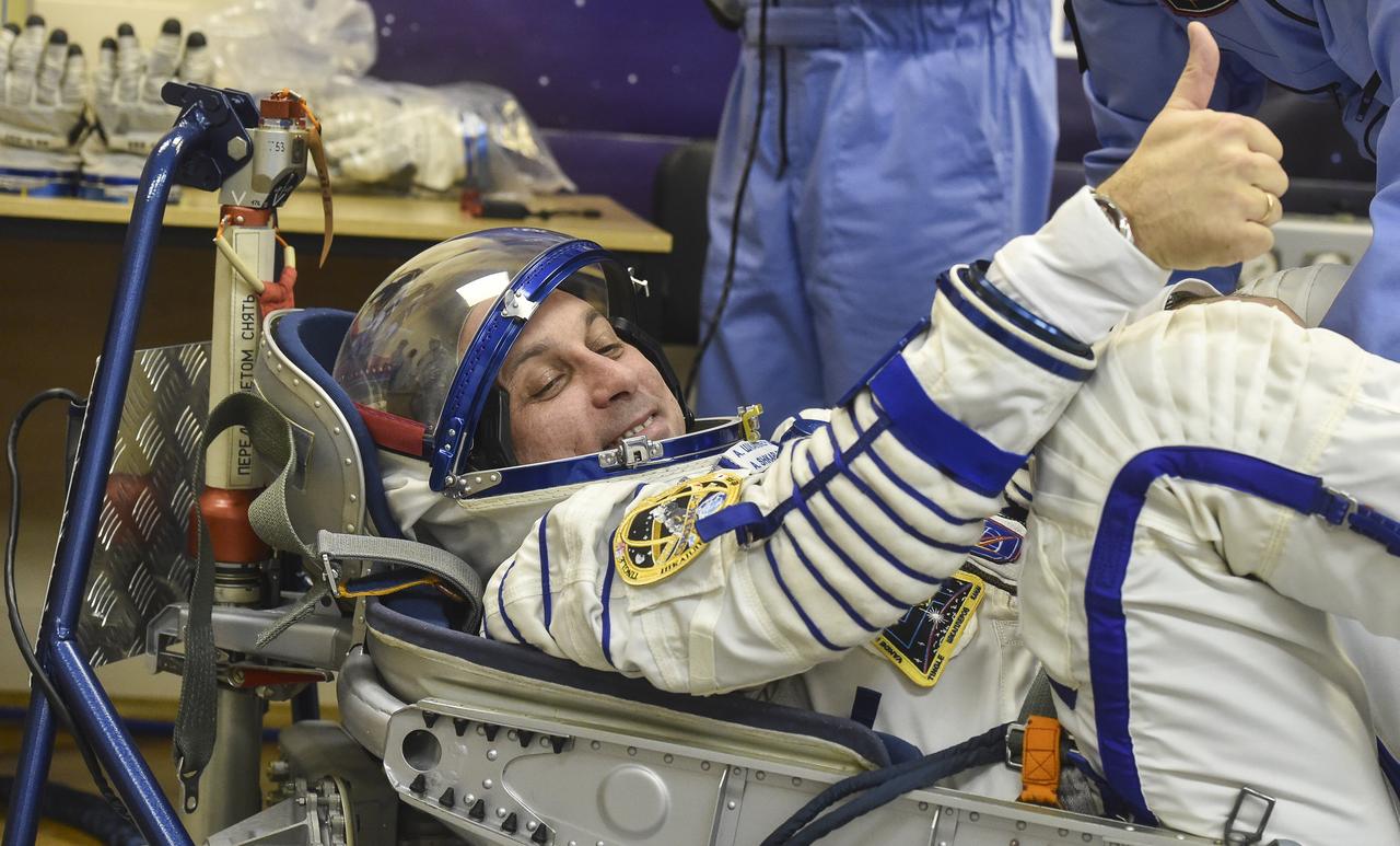 Expedition 54 Soyuz Commander Anton Shkaplerov of Roscosmos prepares to have his Russian Sokol suit pressure checked in preparation for launch aboard the Soyuz MS-07 spacecraft, Sunday, Dec. 17, 2017 in Baikonur, Kazakhstan. Launch of the Soyuz rocket will send Shkaplerov and fellow crewmates flight engineer Scott Tingle of NASA and flight engineer Norishige Kanai of the Japan Aerospace Exploration Agency (JAXA) on a five month mission aboard the International Space Station. Photo Credit: (NASA/GCTC/Andrey Shelepin)