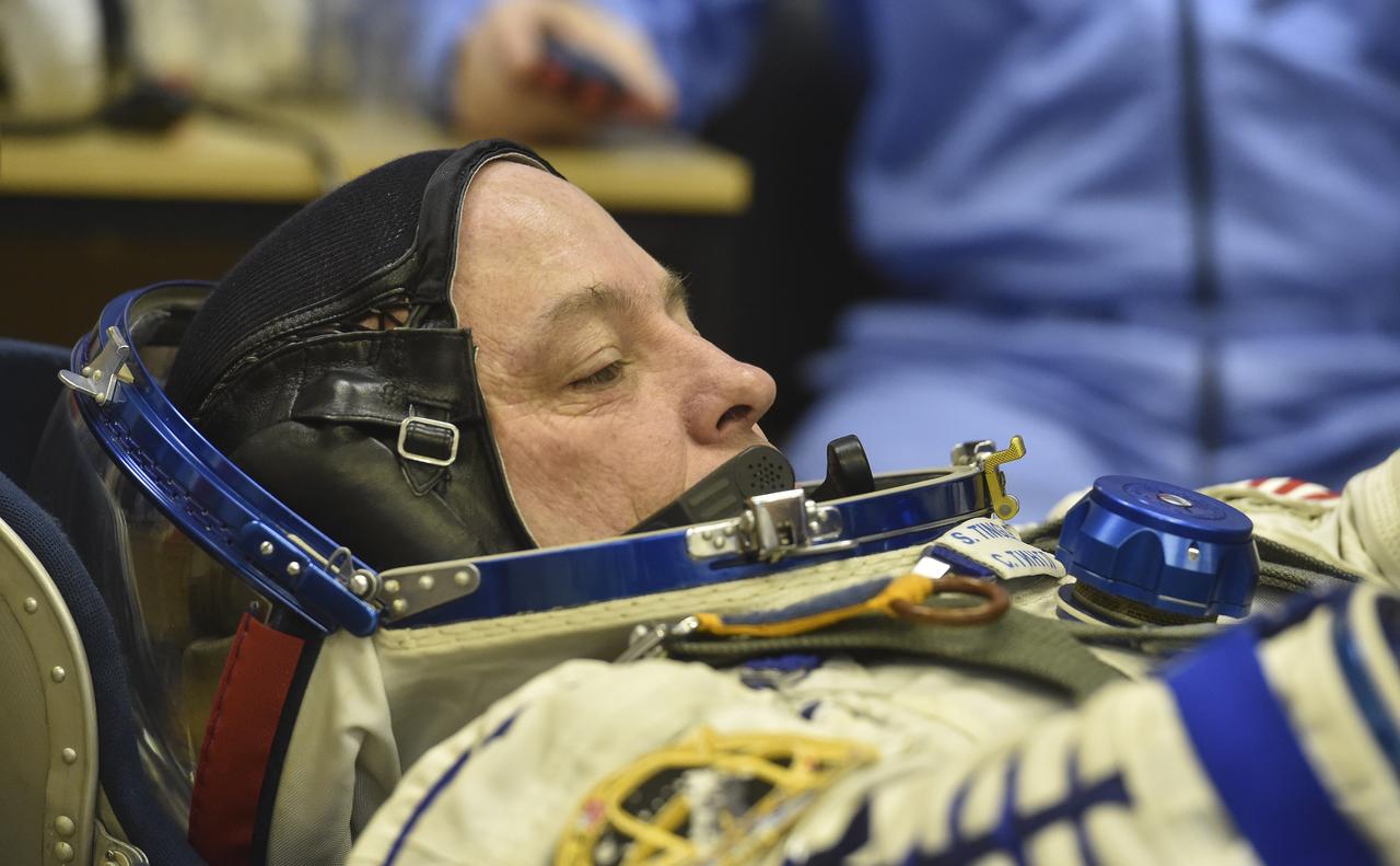 Expedition 54 flight engineer Scott Tingle of NASA prepares to have his Russian Sokol suit pressure checked in preparation for launch aboard the Soyuz MS-07 spacecraft, Sunday, Dec. 17, 2017 in Baikonur, Kazakhstan. Launch of the Soyuz rocket will send Tingle and fellow crewmates Soyuz Commander Anton Shkaplerov of Roscosmos and flight engineer Norishige Kanai of the Japan Aerospace Exploration Agency (JAXA) on a five month mission aboard the International Space Station. Photo Credit: (NASA/GCTC/Andrey Shelepin)
