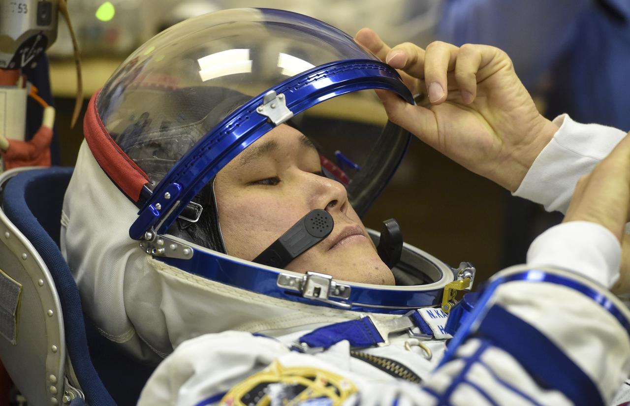 Expedition 54 flight engineer Norishige Kanai of the Japan Aerospace Exploration Agency (JAXA) prepares to have his Russian Sokol suit pressure checked in preparation for launch aboard the Soyuz MS-07 spacecraft, Sunday, Dec. 17, 2017 in Baikonur, Kazakhstan. Launch of the Soyuz rocket will send Kanai and fellow crewmates flight engineer Scott Tingle of NASA and Soyuz Commander Anton Shkaplerov of Roscosmos on a five month mission aboard the International Space Station. Photo Credit: (NASA/GCTC/Andrey Shelepin)