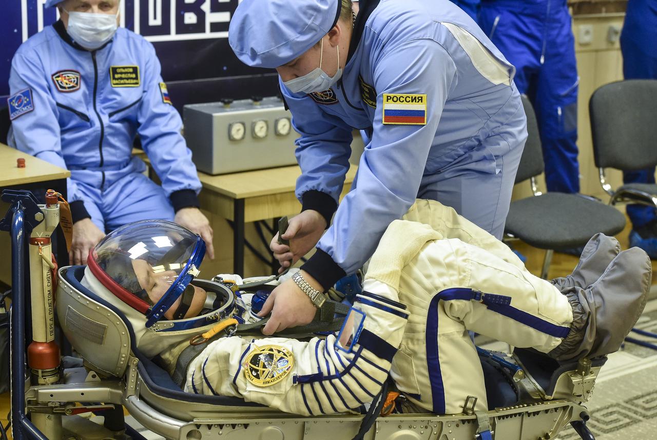 Expedition 54 flight engineer Norishige Kanai of the Japan Aerospace Exploration Agency (JAXA) prepares to have his Russian Sokol suit pressure checked in preparation for launch aboard the Soyuz MS-07 spacecraft, Sunday, Dec. 17, 2017 in Baikonur, Kazakhstan. Launch of the Soyuz rocket will send Kanai and fellow crewmates flight engineer Scott Tingle of NASA and Soyuz Commander Anton Shkaplerov of Roscosmos on a five month mission aboard the International Space Station. Photo Credit: (NASA/GCTC/Andrey Shelepin)
