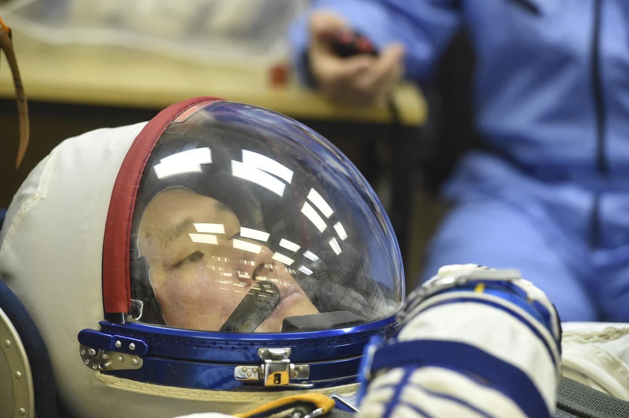 Expedition 54 flight engineer Norishige Kanai of the Japan Aerospace Exploration Agency (JAXA) has his Russian Sokol suit pressure checked in preparation for launch aboard the Soyuz MS-07 spacecraft, Sunday, Dec. 17, 2017 in Baikonur, Kazakhstan. Launch of the Soyuz rocket will send Kanai and fellow crewmates flight engineer Scott Tingle of NASA and Soyuz Commander Anton Shkaplerov of Roscosmos on a five month mission aboard the International Space Station. Photo Credit: (NASA/GCTC/Andrey Shelepin)