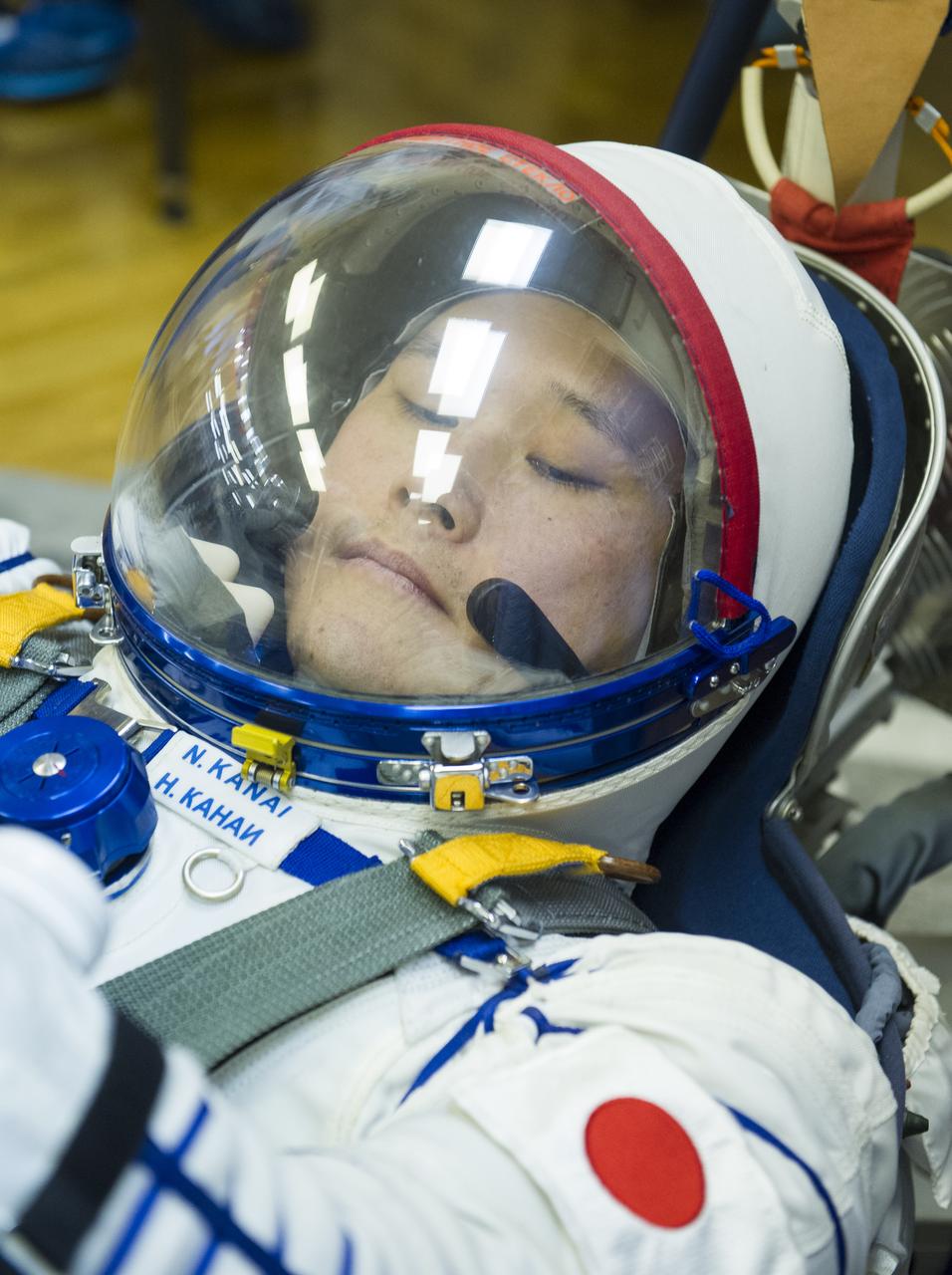 Expedition 54 flight engineer Norishige Kanai of Japan Aerospace Exploration Agency (JAXA) his Russian Sokol suit pressure checked in preparation for launch aboard the Soyuz MS-07 spacecraft, Sunday, Dec. 17, 2017 in Baikonur, Kazakhstan. Launch of the Soyuz rocket will send Kanai and fellow crewmates flight engineer Scott Tingle of NASA and Soyuz Commander Anton Shkaplerov of Roscosmos on a five month mission aboard the International Space Station. Photo Credit: (NASA/GCTC/Andrey Shelepin)