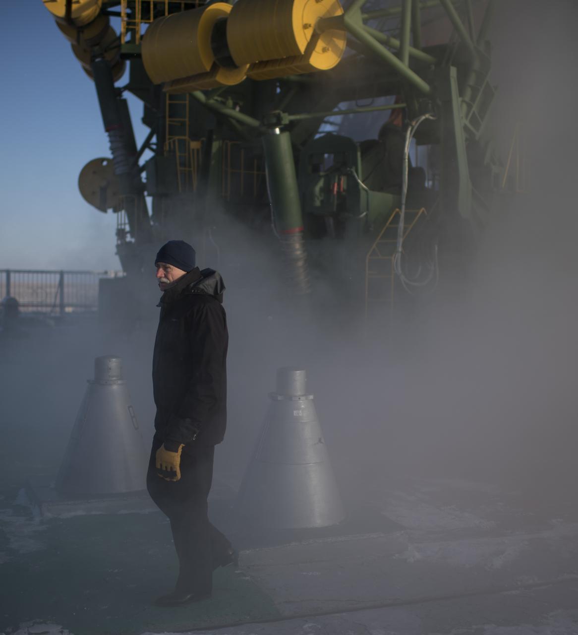 William Gerstenmaier, NASA Associate Administrator for Human Exploration and Operations is seen on the launch pad with the Soyuz MS-07 spacecraft, Sunday, Dec. 17, 2017 at the Baikonur Cosmodrome in Kazakhstan.  Expedition 54 Soyuz Commander Anton Shkaplerov of Roscosmos, flight engineer Scott Tingle of NASA, and flight engineer Norishige Kanai of the Japan Aerospace Exploration Agency (JAXA) launched at 2:21 a.m. EST (1:21 p.m. Baikonur time) on Dec. 17 to begin a five month mission aboard the International Space Station.  Photo Credit: (NASA/Joel Kowsky)