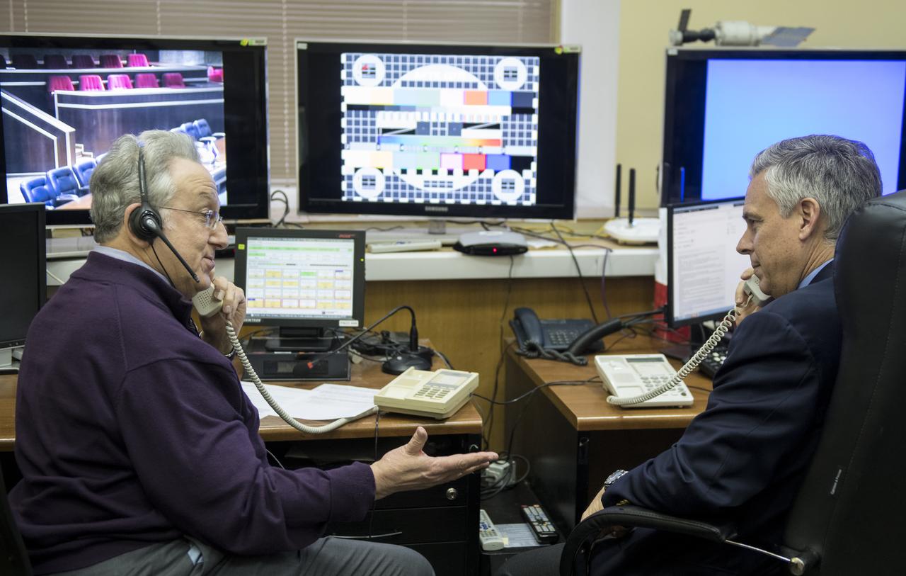 U.S. Ambassador to Russia Jon Huntsman Jr., right, is seen during an interview with NASA Public Affairs Officer Rob Navias, left, in the Moscow Mission Control Center in Korolev, Russia after the Soyuz MS-07 spacecraft docked with the International Space Station, Tuesday, Dec. 19, 2017.  Photo Credit: (NASA/Joel Kowsky)