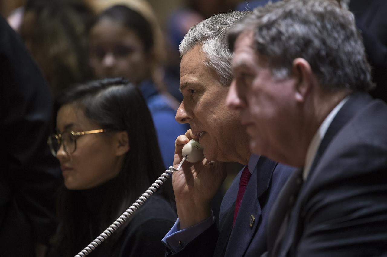 U.S. Ambassador to Russia Jon Huntsman Jr. speaks with the Soyuz MS-07 crew from the Moscow Mission Control Center in Korolev, Russia a few hours after the Soyuz MS-07 docked to the International Space Station on Tuesday, Dec. 19, 2017. Hatches were opened at 5:55 a.m. EST and Anton Shkaplerov of Roscosmos, Scott Tingle of NASA, and Norishige Kanai of the Japan Aerospace Exploration Agency (JAXA) joined Expedition 54 Commander Alexander Misurkin of Roscosmos and crewmates Mark Vande Hei and Joe Acaba of NASA aboard the orbiting laboratory. Photo Credit: (NASA/Joel Kowsky)