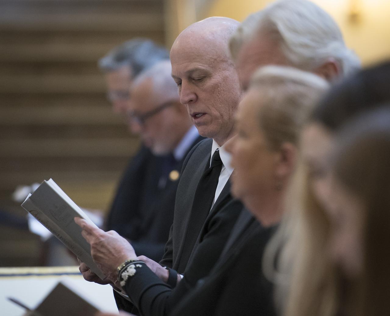 Family and friends attend the funeral service for former NASA astronaut Captain Bruce McCandless II, USN (Ret.), Tuesday, Jan. 16, 2018 at the United States Naval Academy Chapel in Annapolis, Maryland. Photo Credit: (NASA/Bill Ingalls)