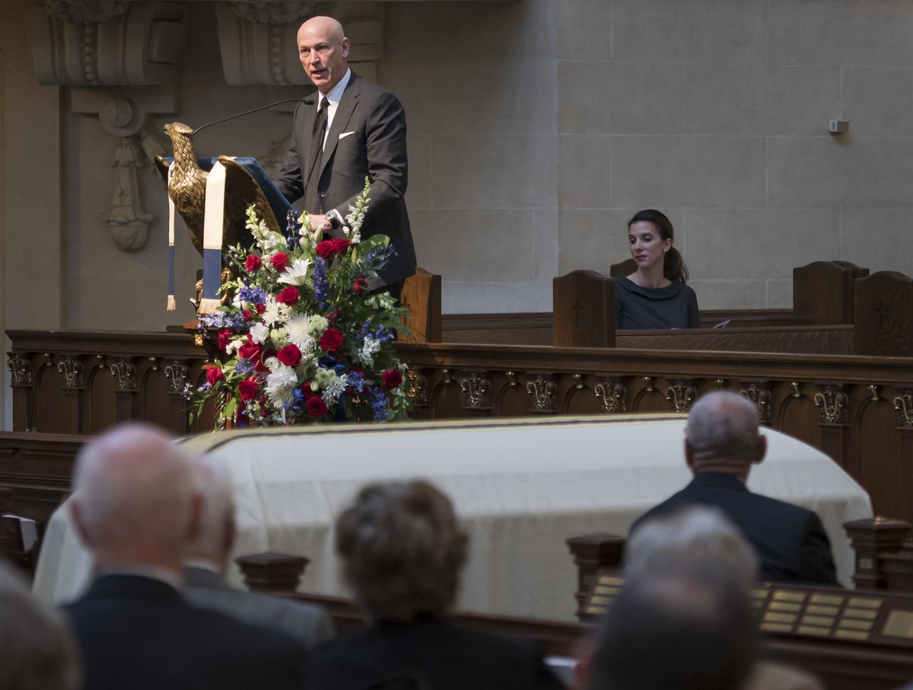 Bruce McCandless III gives remarks during the funeral service for his father, former NASA astronaut Captain Bruce McCandless II, USN (Ret.), Tuesday, Jan. 16, 2018 at the United States Naval Academy Chapel in Annapolis, Maryland. Photo Credit: (NASA/Bill Ingalls)