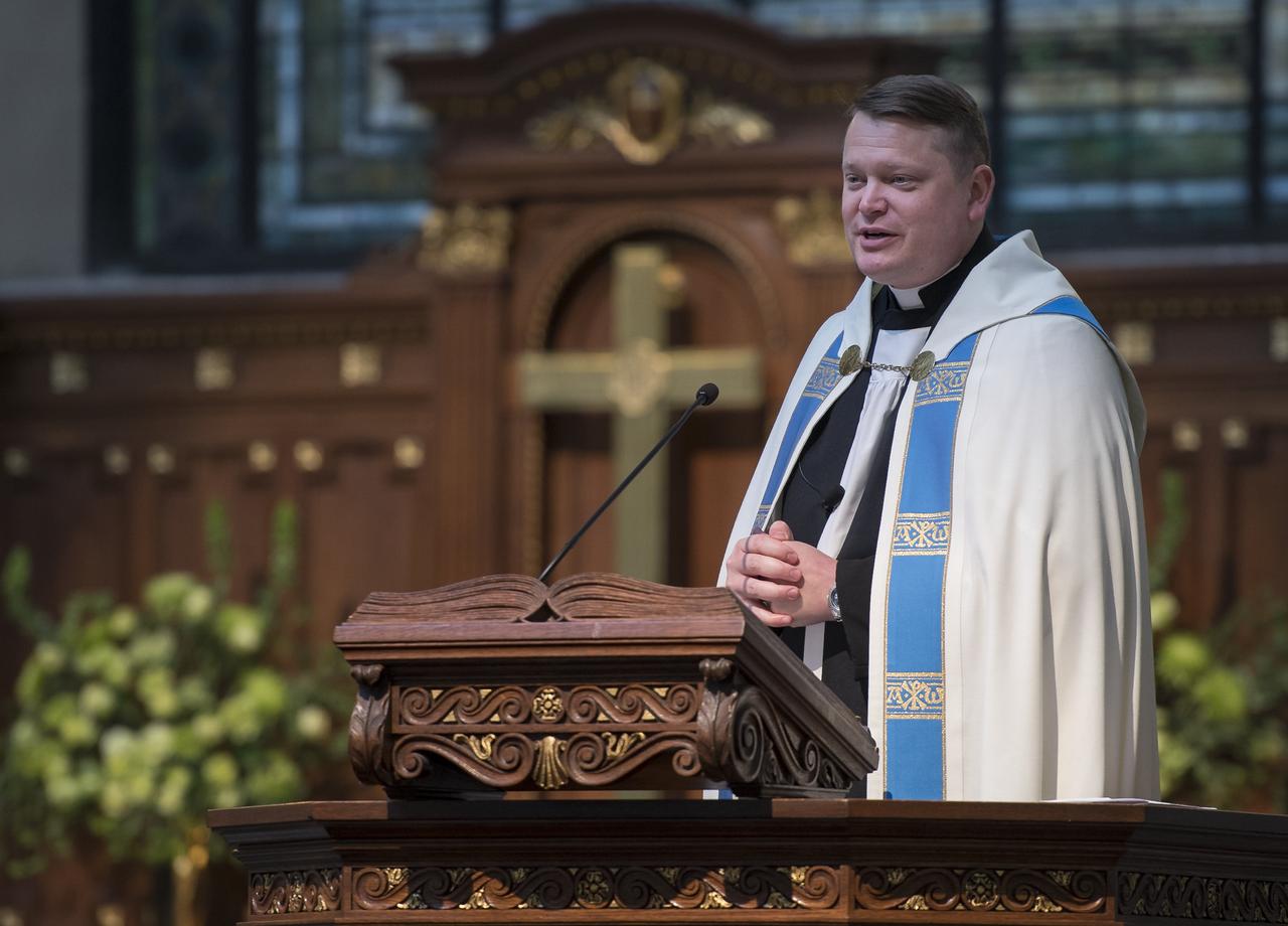 Chaplain McGrath over sees the funeral service for former NASA astronaut Captain Bruce McCandless II, USN (Ret.), Tuesday, Jan. 16, 2018 at the United States Naval Academy Chapel in Annapolis, Maryland. Photo Credit: (NASA/Bill Ingalls)
