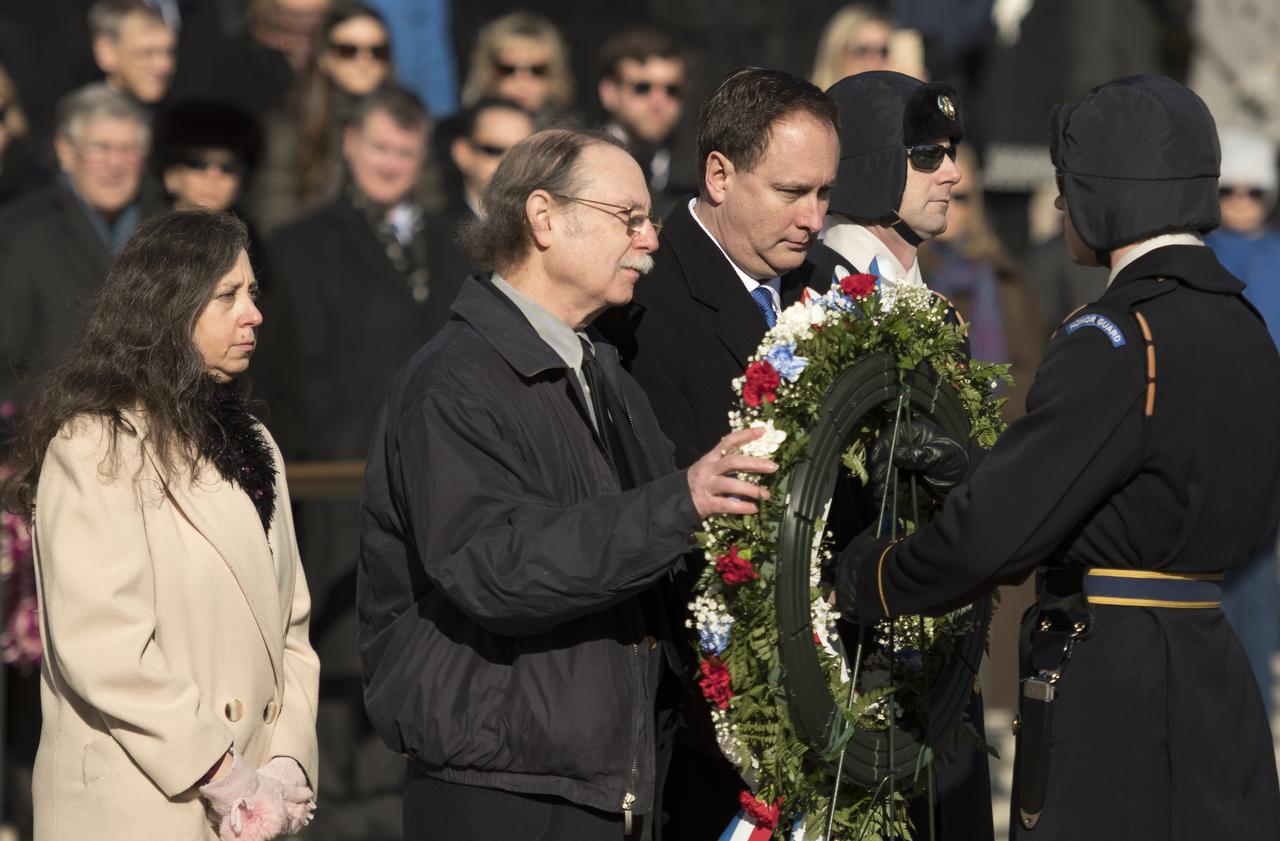 Amy Resnik, sister-in-law, left, and Chuck Resnik, brother of the late space shuttle Challenger astronaut Judy Resnik, along with acting NASA Administrator Robert Lightfoot, third from left, lay a wreath at the Tomb of the Unknowns during NASA's Day of Remembrance, Thursday, Jan. 25, 2018, Arlington National Cemetery in Arlington, Virginia. Wreaths were laid in memory of those men and women who lost their lives in the quest for space exploration. Photo Credit: (NASA/Bill Ingalls)