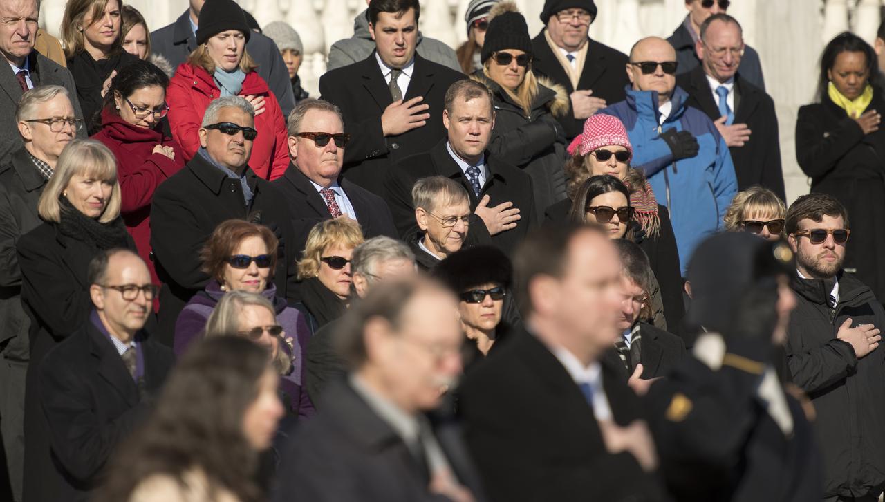 NASA personnel and members of the public watch as a wreath is laid at Tomb of the Unknowns during NASA's Day of Remembrance, Thursday, Jan. 25, 2018, at Arlington National Cemetery in Arlington, Virginia. Wreaths were laid in memory of those men and women who lost their lives in the quest for space exploration. Photo Credit: (NASA/Bill Ingalls)