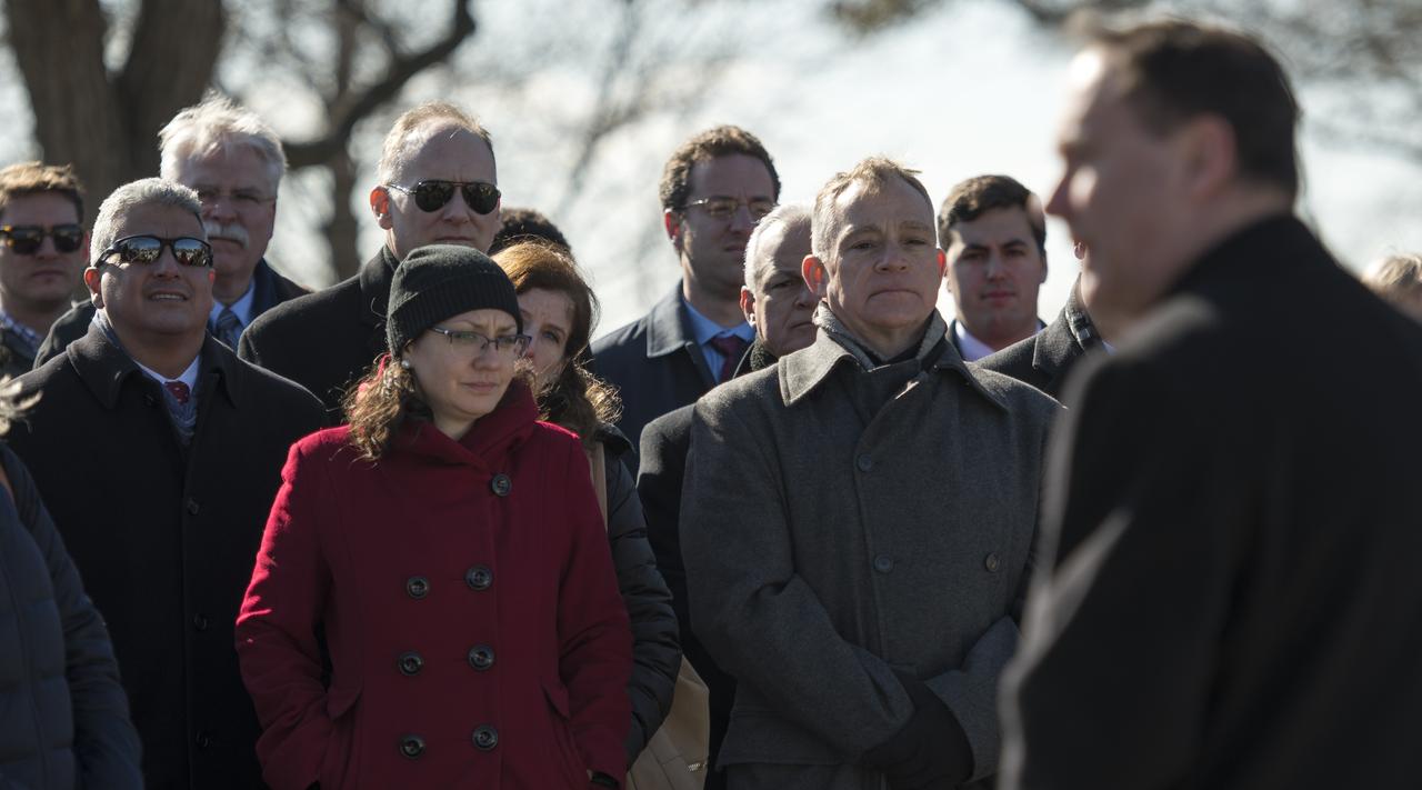 NASA employees and members of the public listen as acting NASA Administrator Robert Lightfoot gives remarks at the graves of Apollo 1 crew members, Virgil Grissom and Roger Chaffee, during a wreath laying ceremony as part of NASA's Day of Remembrance, Thursday, Jan. 25, 2018, at Arlington National Cemetery in Arlington, Virginia. Wreaths were laid in memory of those men and women who lost their lives in the quest for space exploration. Photo Credit: (NASA/Bill Ingalls)