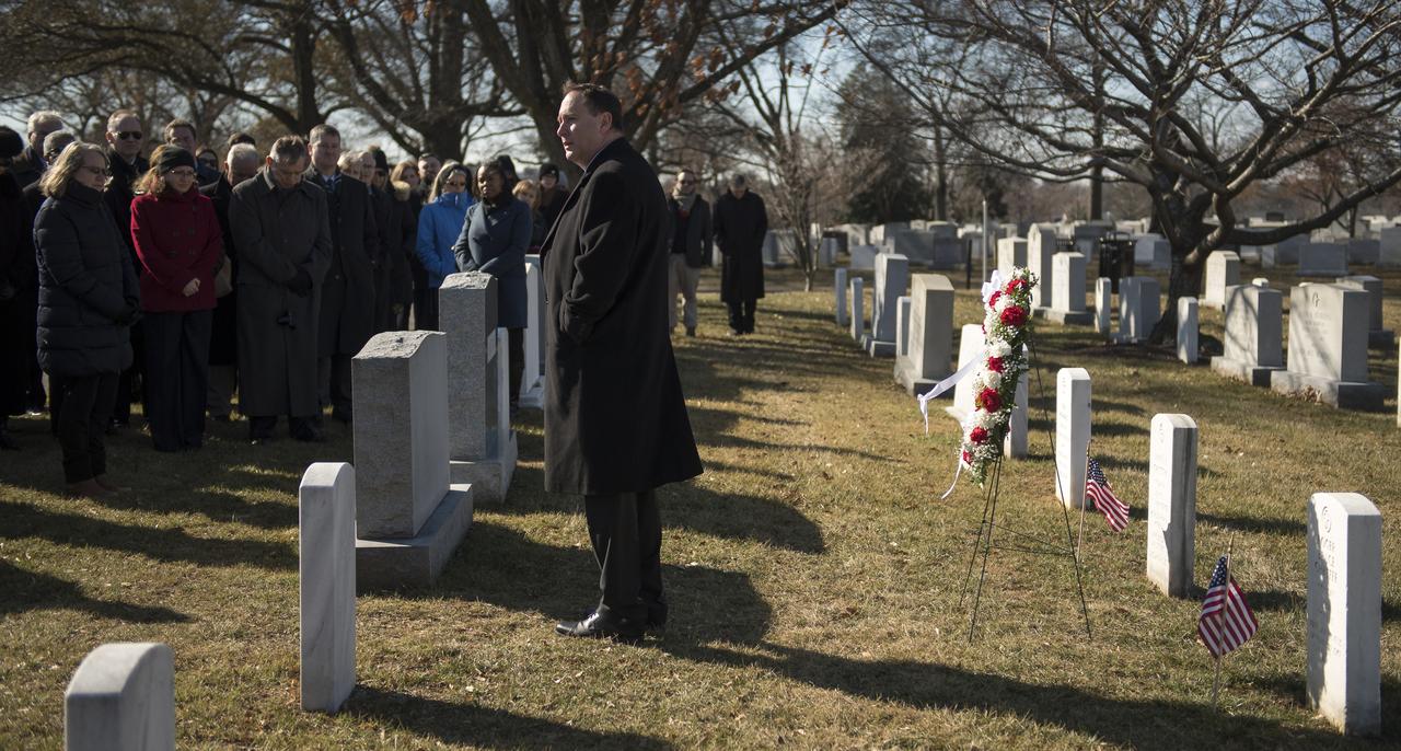 Acting NASA Administrator Robert Lightfoot gives remarks at the graves of Apollo 1 crew members, Virgil Grissom and Roger Chaffee, during a wreath laying ceremony as part of NASA's Day of Remembrance, Thursday, Jan. 25, 2018, at Arlington National Cemetery in Arlington, Virginia. Wreaths were laid in memory of those men and women who lost their lives in the quest for space exploration. Photo Credit: (NASA/Bill Ingalls)