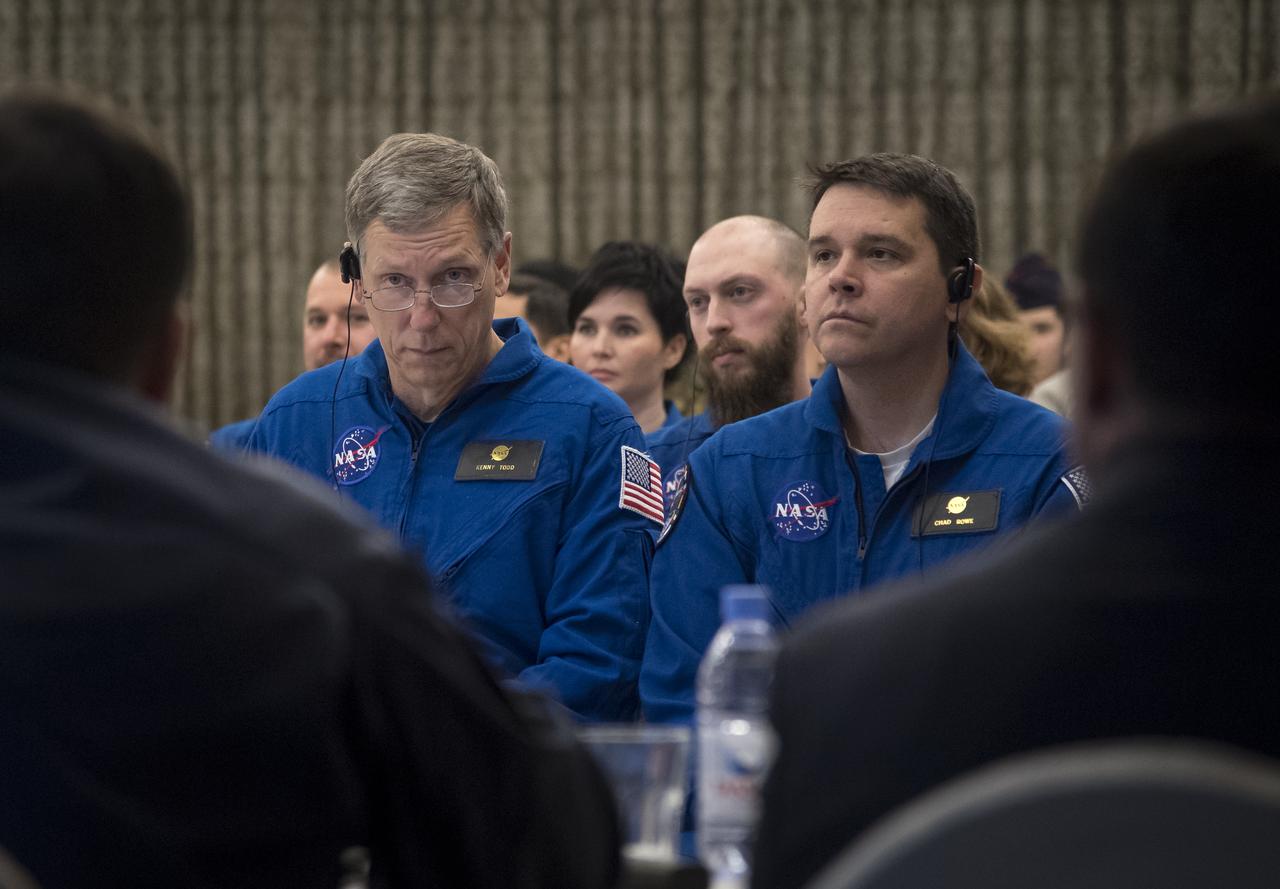 NASA International Space Station Operations Integration Manager Kenny Todd, left, and NASA Director for Human Space Flight Programs, Russia, Chad Rowe, along with Roscosmos and Russian Search and Recovery Forces, meet to discuss the readiness for the landing of Expedition 54 crew members Joe Acaba and Mark Vande Hei of NASA and cosmonaut Alexander Misurkin Sunday, Feb. 25, 2018. Acaba, Vande Hei, and Misurkin are returning after 168 days in space where they served as members of the Expedition 53 and 54 crews onboard the International Space Station. Photo Credit: (NASA/Bill Ingalls)