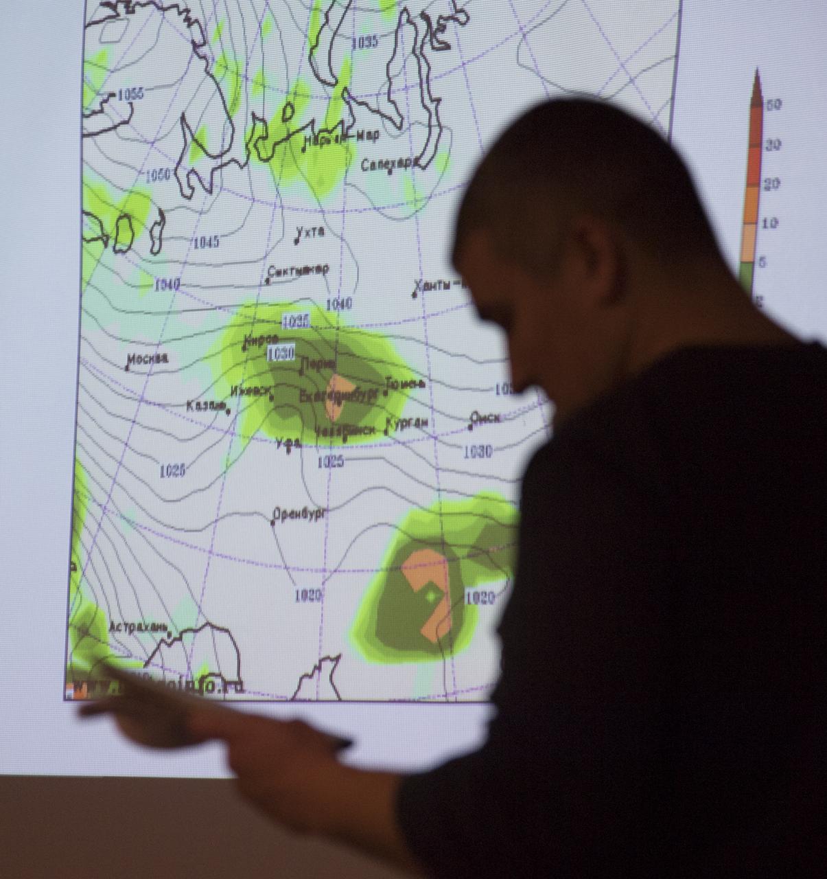 NASA and Roscosmos team members, along with Russian Search and Recovery Forces, meet to discuss the readiness for the landing of Expedition 54 crew members Joe Acaba and Mark Vande Hei of NASA and cosmonaut Alexander Misurkin Sunday, Feb. 25, 2018. Acaba, Vande Hei, and Misurkin are returning after 168 days in space where they served as members of the Expedition 53 and 54 crews onboard the International Space Station. Photo Credit: (NASA/Bill Ingalls)