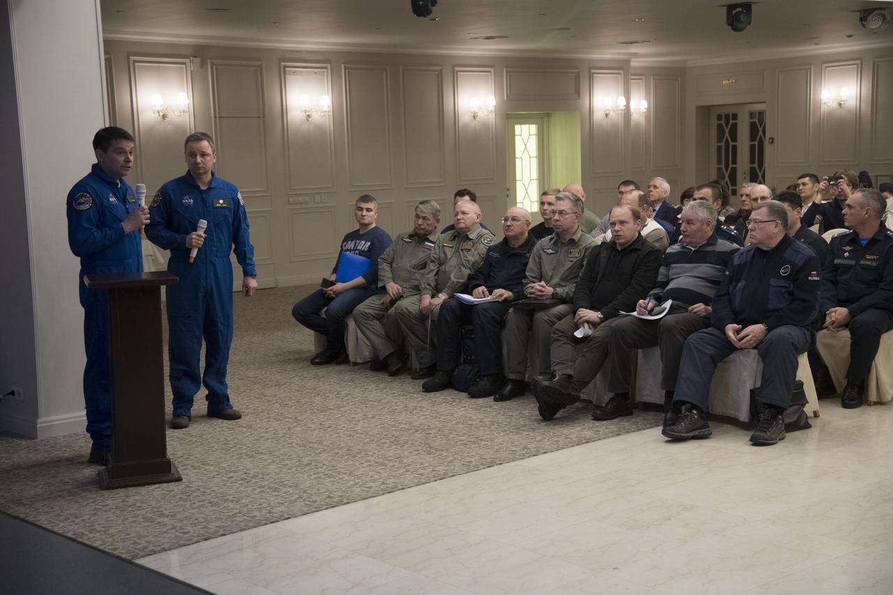 NASA Director for Human Space Flight Programs, Russia, Chad Rowe, left talks during a meeting with NASA, Roscosmos and Russian Search and Recovery Forces where the readiness for the landing of Expedition 54 crew members Joe Acaba and Mark Vande Hei of NASA and cosmonaut Alexander Misurkin was discussed, Sunday, Feb. 25, 2018. Acaba, Vande Hei, and Misurkin are returning after 168 days in space where they served as members of the Expedition 53 and 54 crews onboard the International Space Station. Photo Credit: (NASA/Bill Ingalls)