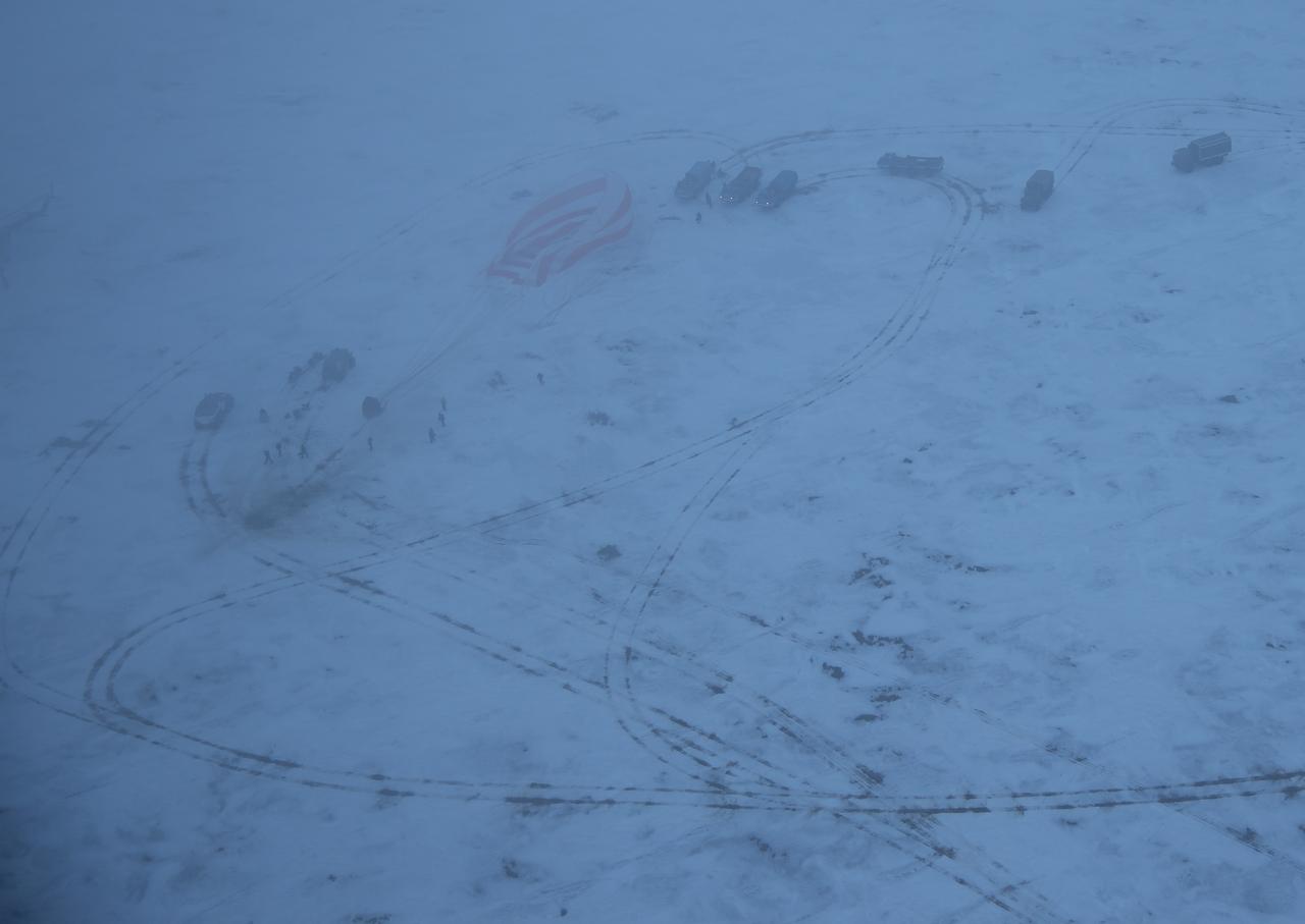 Russian Search and Rescue teams arrive at the Soyuz MS-06 spacecraft shortly after it landed with Expedition 54 crew members Joe Acaba and Mark Vande Hei of NASA and cosmonaut Alexander Misurkin near the town of Zhezkazgan, Kazakhstan on Wednesday, Feb. 28, 2018 (February 27 Eastern time.) Acaba, Vande Hei, and Misurkin are returning after 168 days in space where they served as members of the Expedition 53 and 54 crews onboard the International Space Station. Photo Credit: (NASA/Bill Ingalls)
