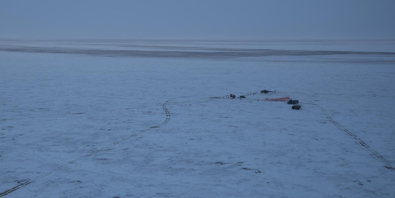 Russian Search and Rescue teams arrive at the Soyuz MS-06 spacecraft shortly after it landed with Expedition 54 crew members Joe Acaba and Mark Vande Hei of NASA and cosmonaut Alexander Misurkin near the town of Zhezkazgan, Kazakhstan on Wednesday, Feb. 28, 2018 (February 27 Eastern time.) Acaba, Vande Hei, and Misurkin are returning after 168 days in space where they served as members of the Expedition 53 and 54 crews onboard the International Space Station. Photo Credit: (NASA/Bill Ingalls)