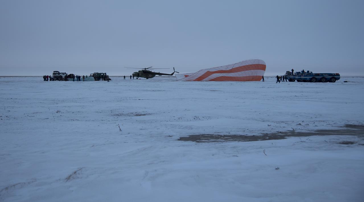 Russian Search and Rescue teams arrive at the Soyuz MS-06 spacecraft shortly after it landed with Expedition 54 crew members Joe Acaba and Mark Vande Hei of NASA and cosmonaut Alexander Misurkin near the town of Zhezkazgan, Kazakhstan on Wednesday, Feb. 28, 2018 (February 27 Eastern time.) Acaba, Vande Hei, and Misurkin are returning after 168 days in space where they served as members of the Expedition 53 and 54 crews onboard the International Space Station. Photo Credit: (NASA/Bill Ingalls)
