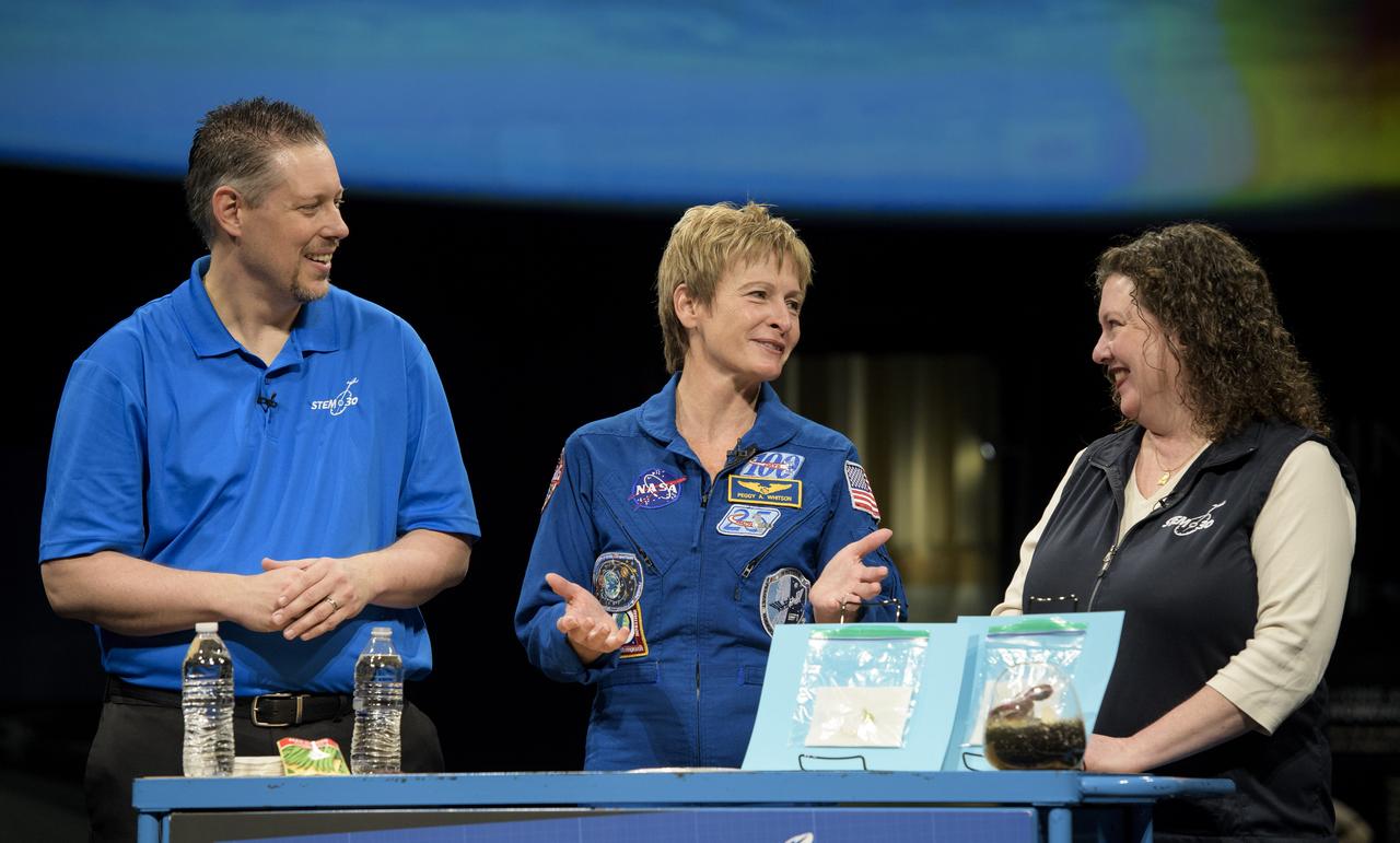 NASA astronaut Peggy Whitson tapes a segment for STEM in 30 with Marty Kelsey, left, and Beth Wilson, Friday, March 2, 2018 at the Smithsonian's National Air and Space Museum in Washington. Whitson spent 288 days onboard the International Space Station as a member of Expedition 50, 51, and 52, conducting four spacewalks and contributing to hundreds of experiments in biology, biotechnology, physical science and Earth science during her stay. Photo Credit: (NASA/Joel Kowsky)