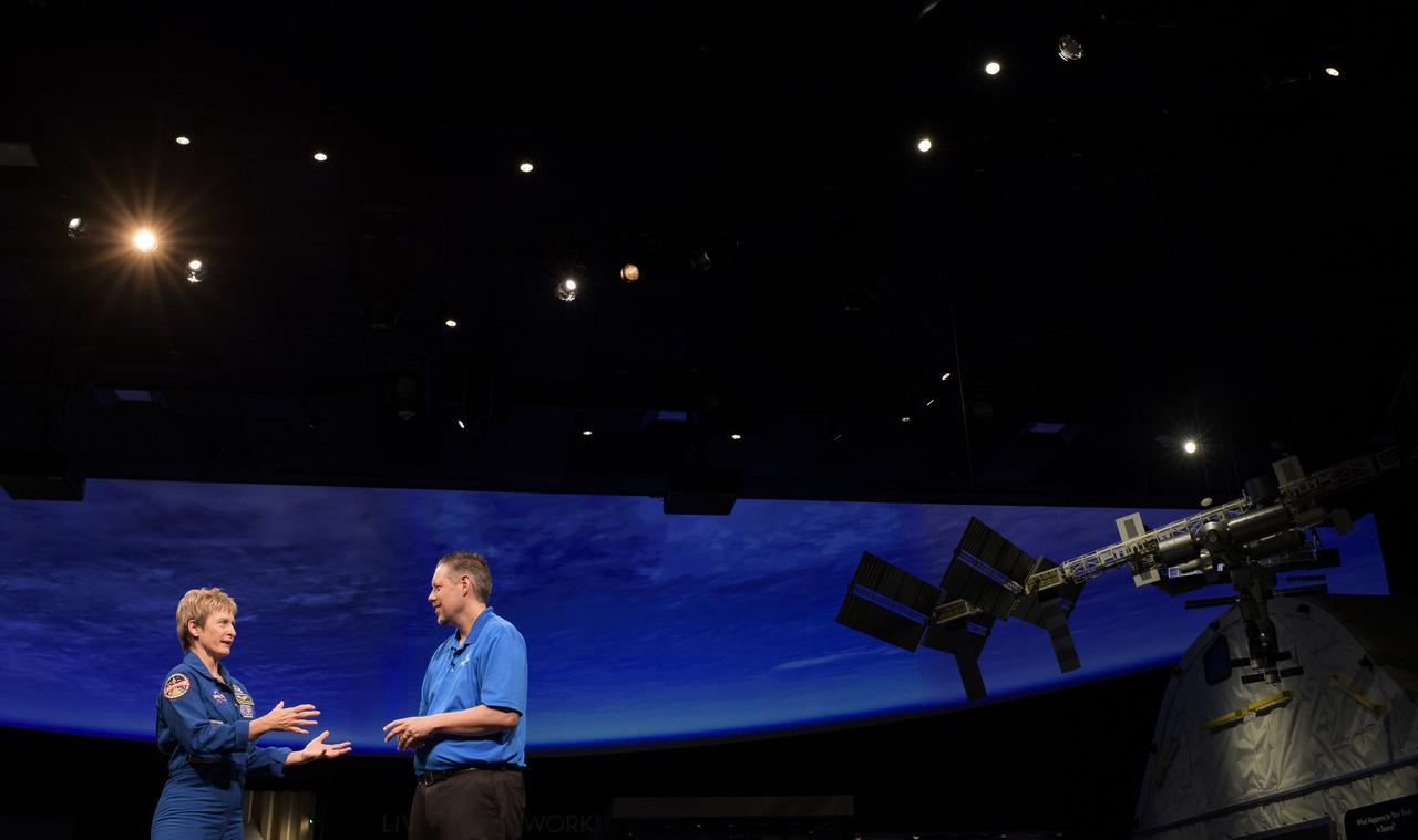 NASA astronaut Peggy Whitson is interviewed by Marty Kelsey, Friday, March 2, 2018 at the Smithsonian's National Air and Space Museum in Washington. Whitson spent 288 days onboard the International Space Station as a member of Expedition 50, 51, and 52, conducting four spacewalks and contributing to hundreds of experiments in biology, biotechnology, physical science and Earth science during her stay. Photo Credit: (NASA/Joel Kowsky)