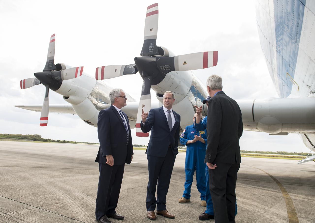 NASA Administrator Jim Bridenstine speaks with Orion and Super Guppy managers before touring the Super Guppy that will carry the flight frame with the Orion crew module and service module inside, to a testing facility in Sandusky, Ohio, for full thermal vacuum testing, Monday, March 11, 2019 at Kennedy Space Center in Florida. For information on NASA's Moon to Mars plans, visit: www.nasa.gov/moontomars Photo credit: (NASA/Aubrey Gemignani)