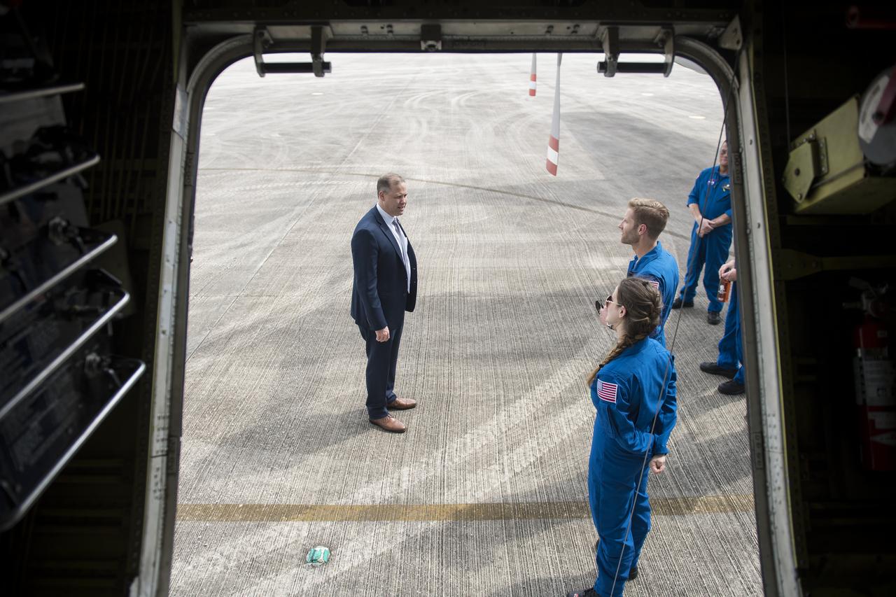 NASA Administrator Jim Bridenstine speaks with pilots and engineers of the super guppy that will carry the flight frame with the Orion crew module and service module inside, to a testing facility in Sandusky, Ohio, for full thermal vacuum testing, Monday, March 11, 2019 at Kennedy Space Center in Florida. For information on NASA's Moon to Mars plans, visit: www.nasa.gov/moontomars Photo credit: (NASA/Aubrey Gemignani)