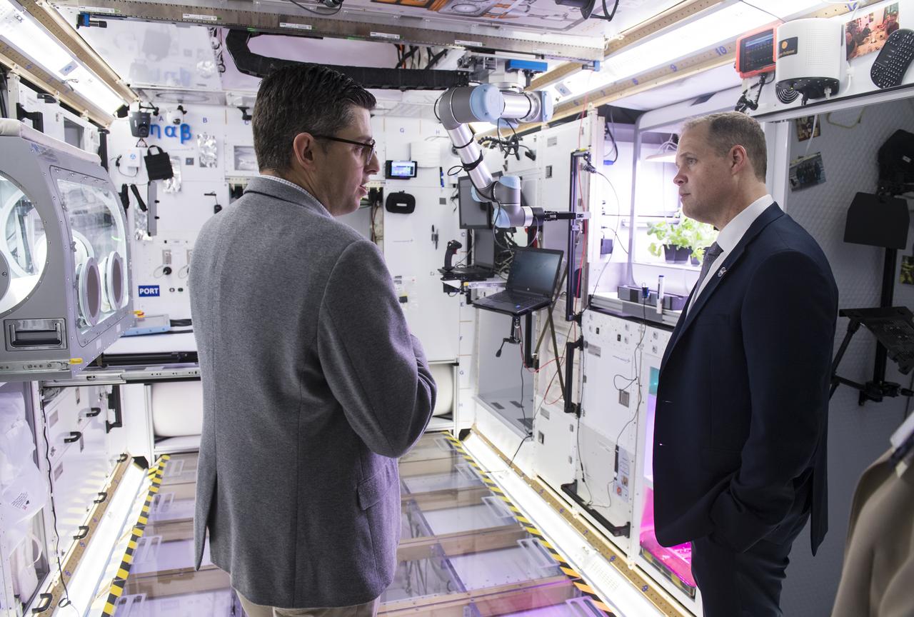 Bill Pratt, Lockheed Martin NextSTEP program manager gives NASA Administrator Jim Bridenstine a tour of the Lockheed Martin Gateway habitat prototype in the Space Station Processing Facility High Bay, after an event to discuss NASA’s progress toward sending astronauts to the Moon and on to Mars, Monday March 11, 2019 at Kennedy Space Center in Florida. For information on NASA's Moon to Mars plans, visit: www.nasa.gov/moontomars Photo credit: (NASA/Aubrey Gemignani)