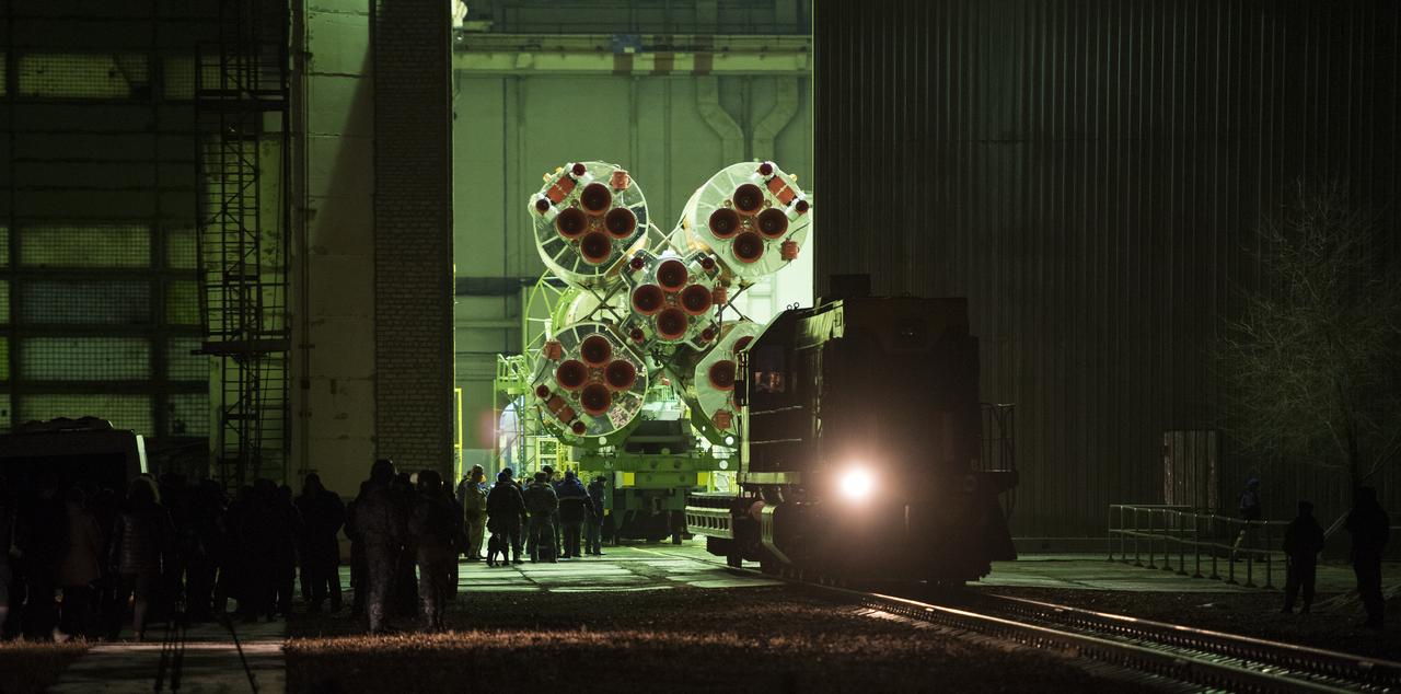The Soyuz rocket is seen inside Building 112 prior to being rolled out by train to the launch pad, Monday, March 19, 2018 at the Baikonur Cosmodrome in Kazakhstan. Expedition 55 crewmembers Ricky Arnold and Drew Feustel of NASA and Oleg Artemyev of Roscosmos are scheduled to launch at 1:44 p.m. Eastern time (11:44 p.m. Baikonur time) on March 21 and will spend the next five months living and working aboard the International Space Station. Photo Credit: (NASA/Joel Kowsky)