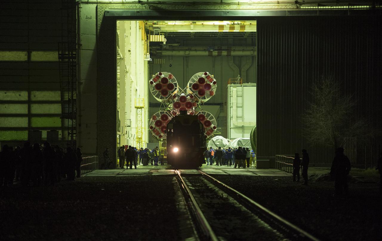 The Soyuz rocket is seen inside Building 112 prior to being rolled out by train to the launch pad, Monday, March 19, 2018 at the Baikonur Cosmodrome in Kazakhstan. Expedition 55 crewmembers Ricky Arnold and Drew Feustel of NASA and Oleg Artemyev of Roscosmos are scheduled to launch at 1:44 p.m. Eastern time (11:44 p.m. Baikonur time) on March 21 and will spend the next five months living and working aboard the International Space Station. Photo Credit: (NASA/Joel Kowsky)