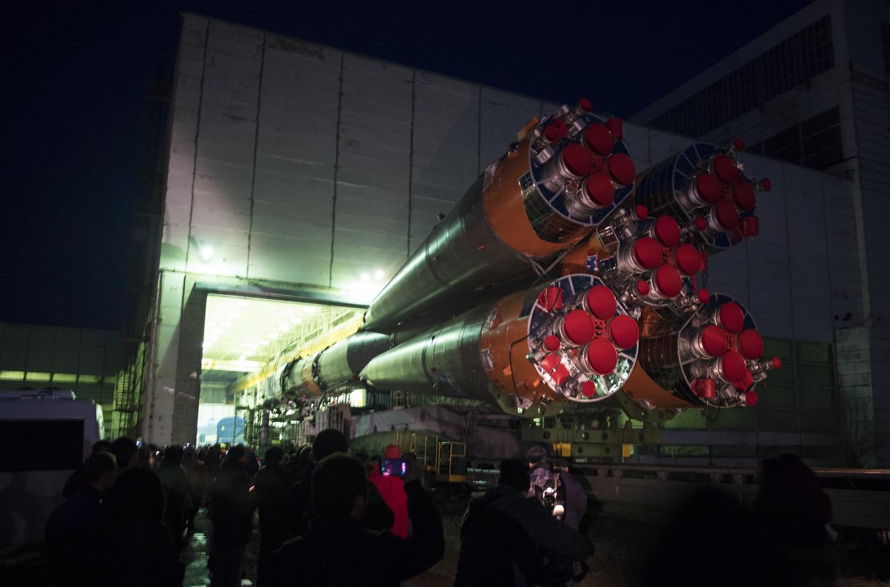 The Soyuz rocket is rolled out by train to the launch pad, Monday, March 19, 2018 at the Baikonur Cosmodrome in Kazakhstan. Expedition 55 crewmembers Ricky Arnold and Drew Feustel of NASA and Oleg Artemyev of Roscosmos are scheduled to launch at 1:44 p.m. Eastern time (11:44 p.m. Baikonur time) on March 21 and will spend the next five months living and working aboard the International Space Station. Photo Credit: (NASA/Joel Kowsky)