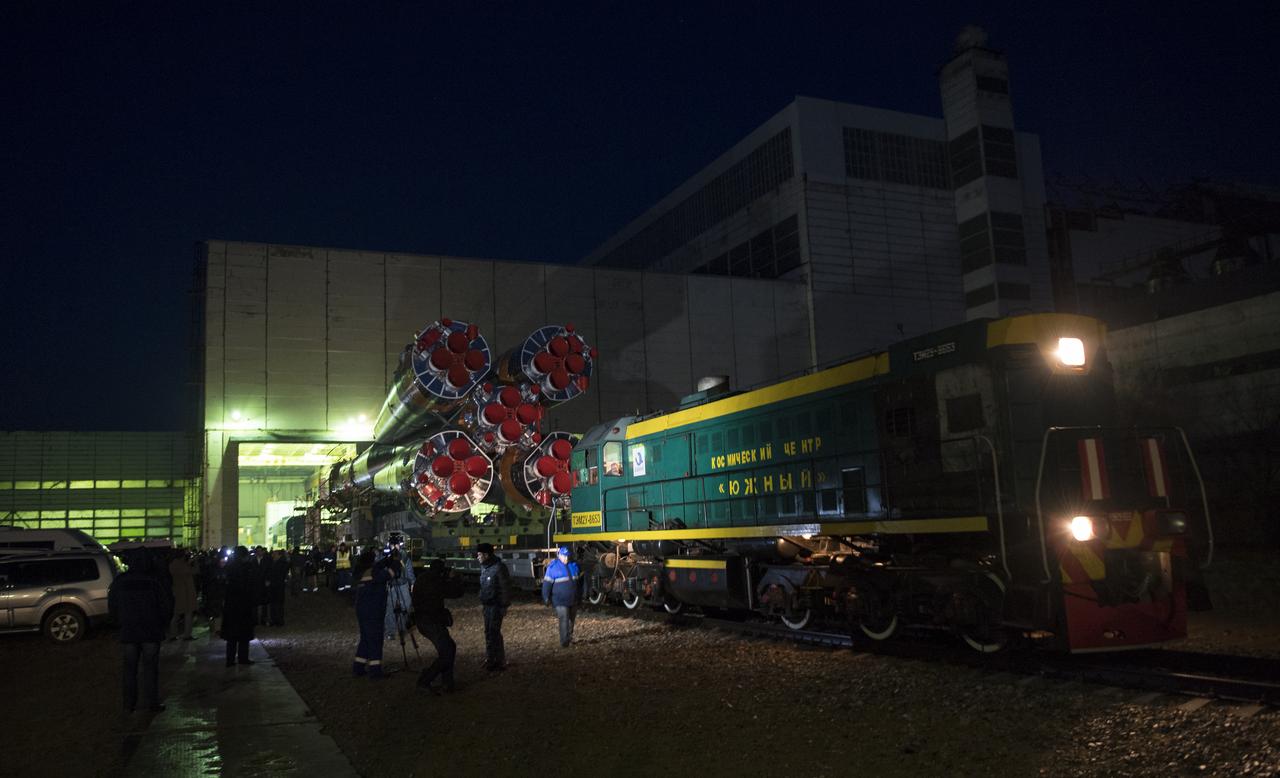 The Soyuz rocket is rolled out by train to the launch pad, Monday, March 19, 2018 at the Baikonur Cosmodrome in Kazakhstan. Expedition 55 crewmembers Ricky Arnold and Drew Feustel of NASA and Oleg Artemyev of Roscosmos are scheduled to launch at 1:44 p.m. Eastern time (11:44 p.m. Baikonur time) on March 21 and will spend the next five months living and working aboard the International Space Station. Photo Credit: (NASA/Joel Kowsky)