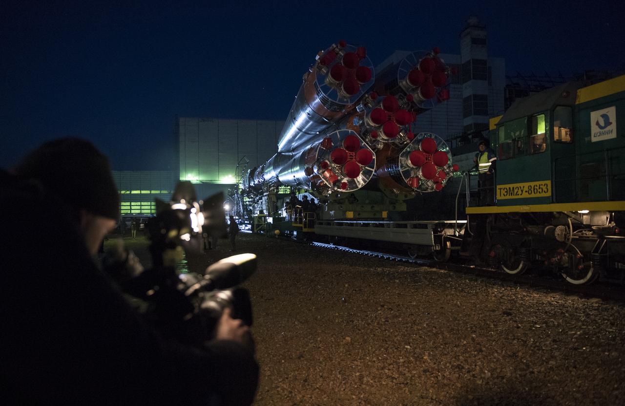 The Soyuz rocket is rolled out by train to the launch pad, Monday, March 19, 2018 at the Baikonur Cosmodrome in Kazakhstan. Expedition 55 crewmembers Ricky Arnold and Drew Feustel of NASA and Oleg Artemyev of Roscosmos are scheduled to launch at 1:44 p.m. Eastern time (11:44 p.m. Baikonur time) on March 21 and will spend the next five months living and working aboard the International Space Station. Photo Credit: (NASA/Joel Kowsky)