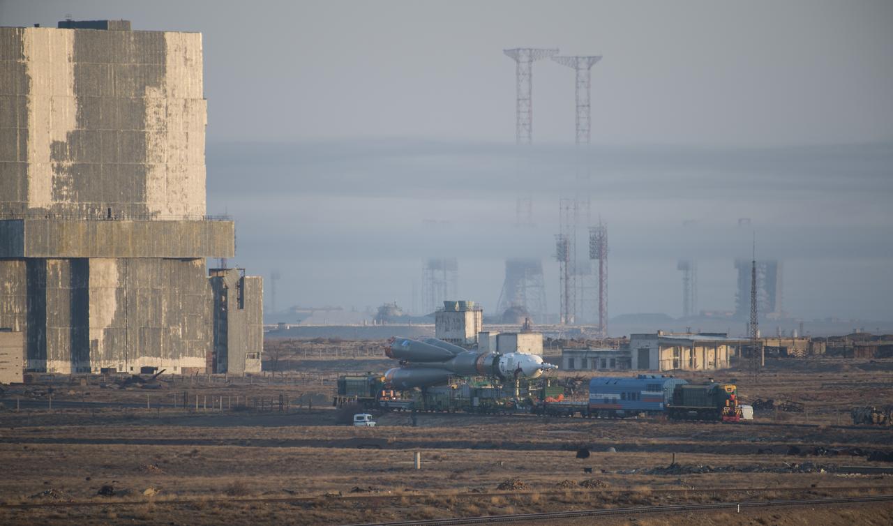 The Soyuz rocket is rolled out by train to the launch pad, Monday, March 19, 2018 at the Baikonur Cosmodrome in Kazakhstan. Expedition 55 crewmembers Ricky Arnold and Drew Feustel of NASA and Oleg Artemyev of Roscosmos are scheduled to launch at 1:44 p.m. Eastern time (11:44 p.m. Baikonur time) on March 21 and will spend the next five months living and working aboard the International Space Station. Photo Credit: (NASA/Joel Kowsky)