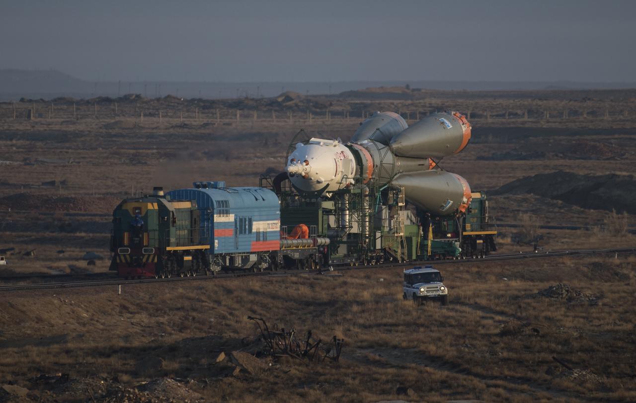 The Soyuz rocket is rolled out by train to the launch pad, Monday, March 19, 2018 at the Baikonur Cosmodrome in Kazakhstan. Expedition 55 crewmembers Ricky Arnold and Drew Feustel of NASA and Oleg Artemyev of Roscosmos are scheduled to launch at 1:44 p.m. Eastern time (11:44 p.m. Baikonur time) on March 21 and will spend the next five months living and working aboard the International Space Station. Photo Credit: (NASA/Joel Kowsky)