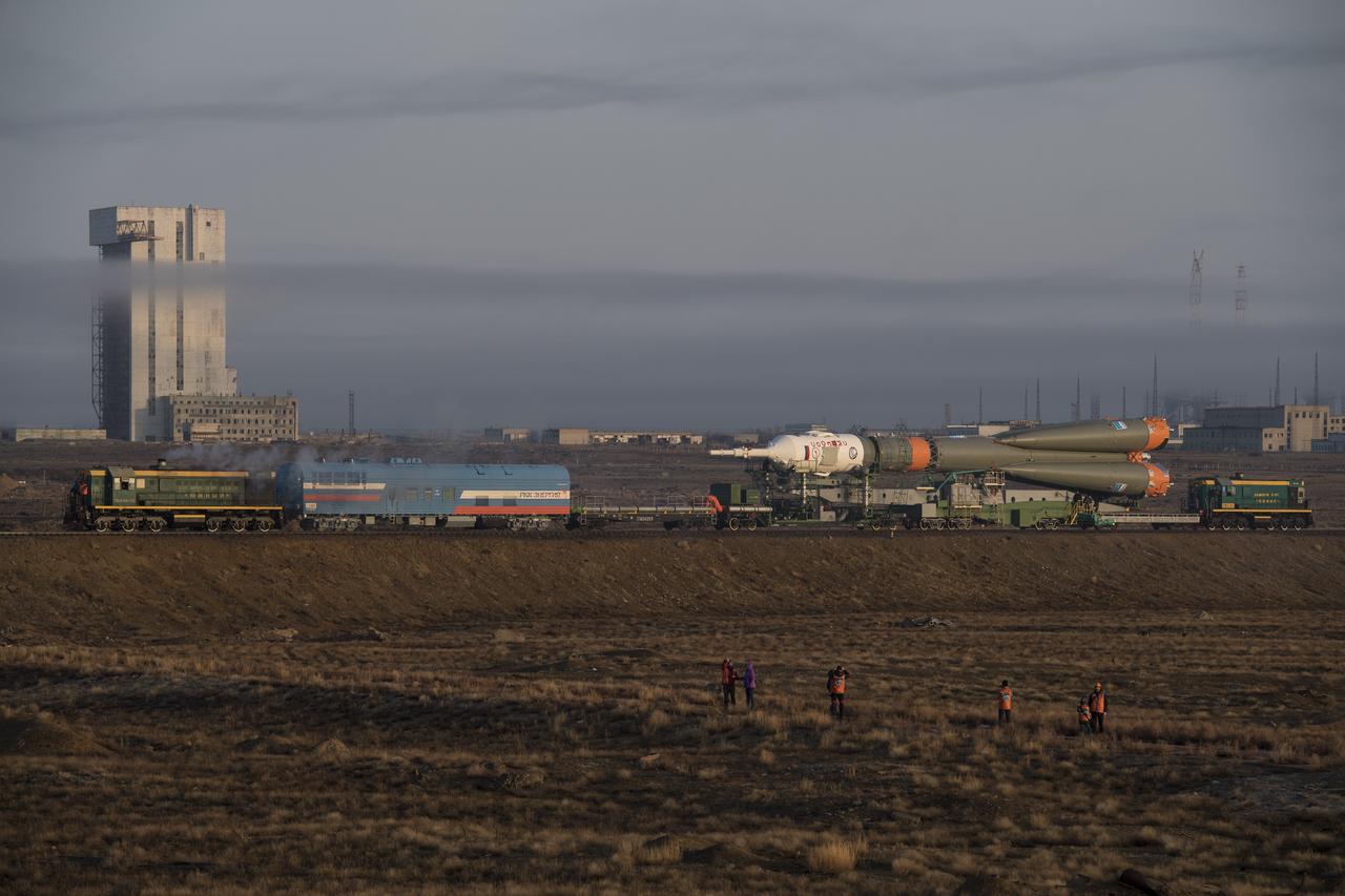 The Soyuz rocket is rolled out by train to the launch pad, Monday, March 19, 2018 at the Baikonur Cosmodrome in Kazakhstan. Expedition 55 crewmembers Ricky Arnold and Drew Feustel of NASA and Oleg Artemyev of Roscosmos are scheduled to launch at 1:44 p.m. Eastern time (11:44 p.m. Baikonur time) on March 21 and will spend the next five months living and working aboard the International Space Station. Photo Credit: (NASA/Joel Kowsky)