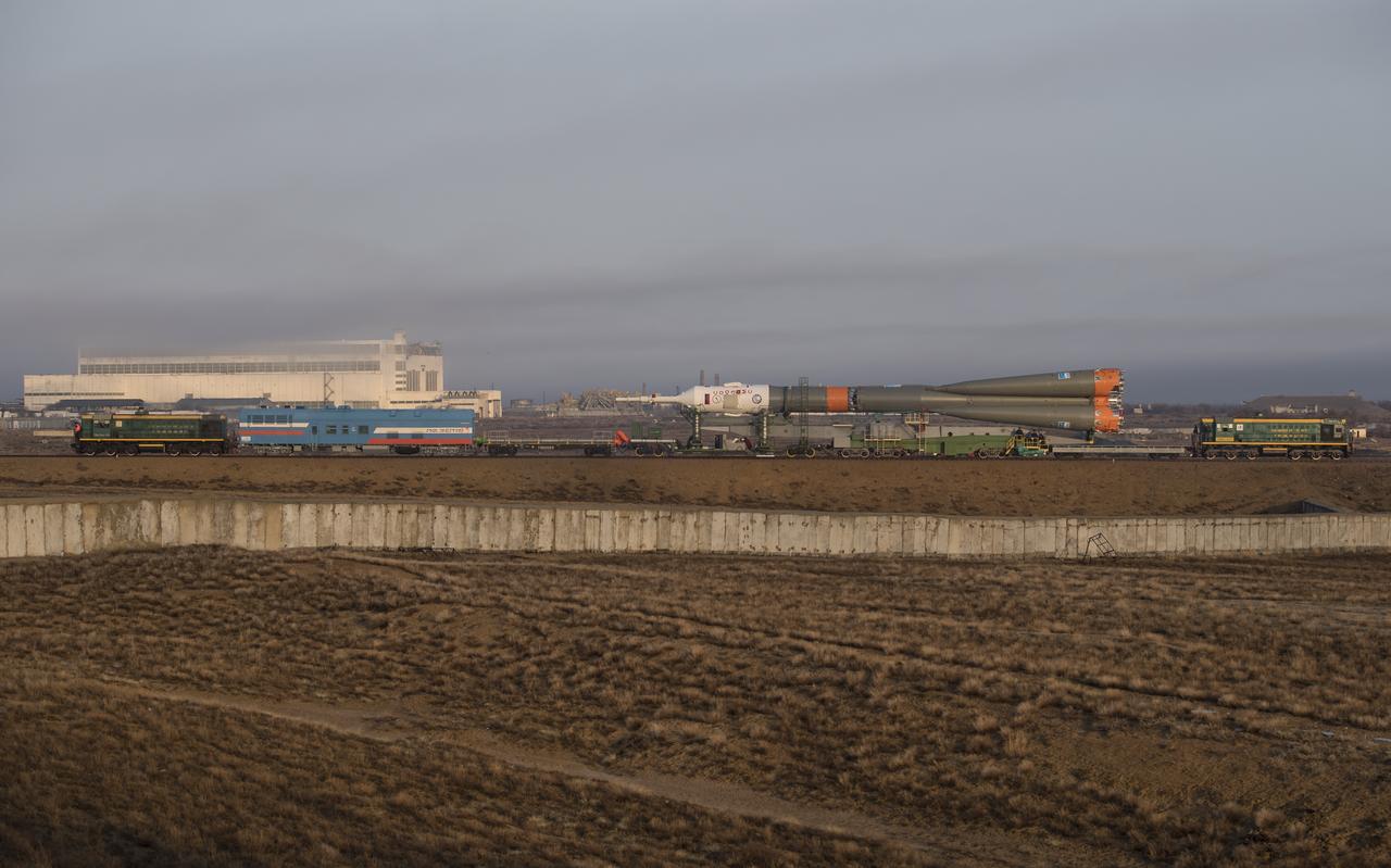 The Soyuz rocket is rolled out by train to the launch pad, Monday, March 19, 2018 at the Baikonur Cosmodrome in Kazakhstan. Expedition 55 crewmembers Ricky Arnold and Drew Feustel of NASA and Oleg Artemyev of Roscosmos are scheduled to launch at 1:44 p.m. Eastern time (11:44 p.m. Baikonur time) on March 21 and will spend the next five months living and working aboard the International Space Station. Photo Credit: (NASA/Joel Kowsky)
