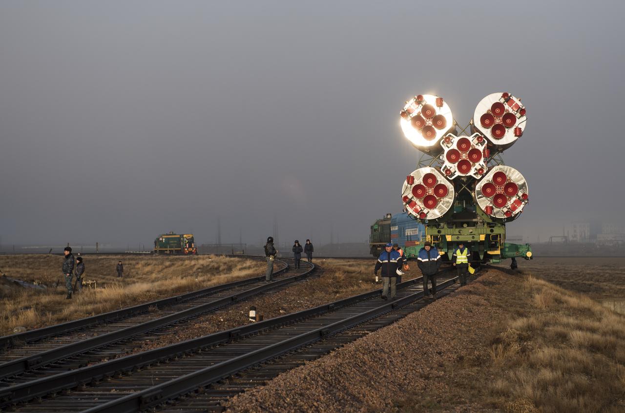 The Soyuz rocket is rolled out by train to the launch pad, Monday, March 19, 2018 at the Baikonur Cosmodrome in Kazakhstan. Expedition 55 crewmembers Ricky Arnold and Drew Feustel of NASA and Oleg Artemyev of Roscosmos are scheduled to launch at 1:44 p.m. Eastern time (11:44 p.m. Baikonur time) on March 21 and will spend the next five months living and working aboard the International Space Station. Photo Credit: (NASA/Joel Kowsky)