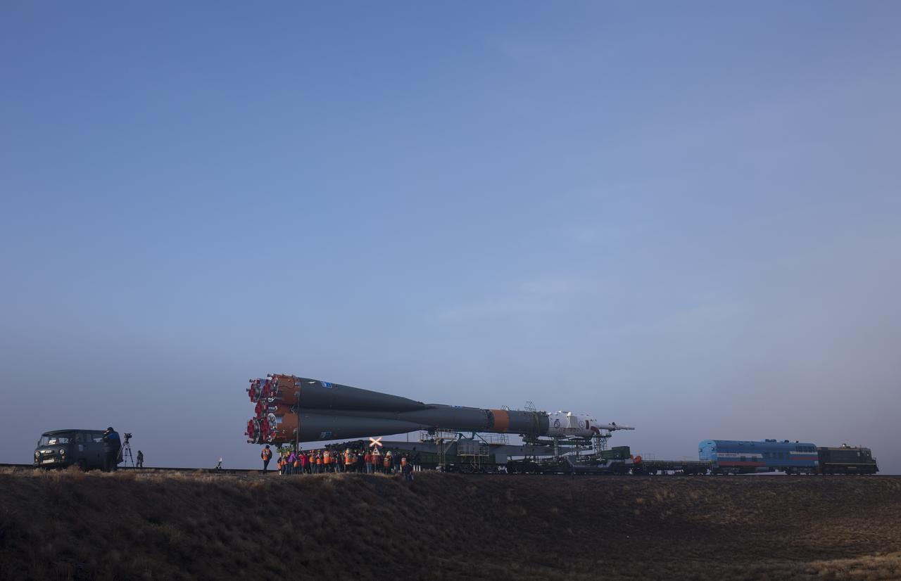 The Soyuz rocket is rolled out by train to the launch pad, Monday, March 19, 2018 at the Baikonur Cosmodrome in Kazakhstan. Expedition 55 crewmembers Ricky Arnold and Drew Feustel of NASA and Oleg Artemyev of Roscosmos are scheduled to launch at 1:44 p.m. Eastern time (11:44 p.m. Baikonur time) on March 21 and will spend the next five months living and working aboard the International Space Station. Photo Credit: (NASA/Joel Kowsky)