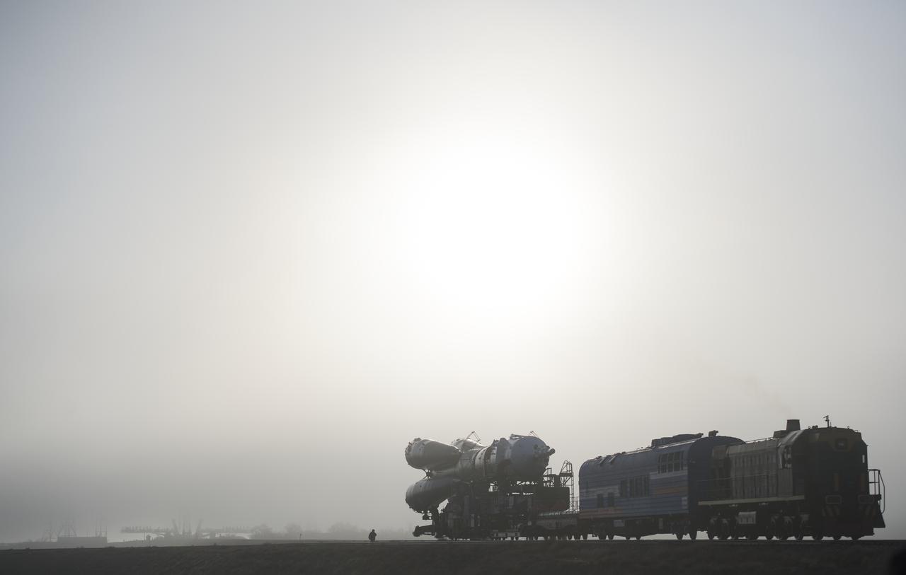 The Soyuz rocket is rolled out by train to the launch pad, Monday, March 19, 2018 at the Baikonur Cosmodrome in Kazakhstan. Expedition 55 crewmembers Ricky Arnold and Drew Feustel of NASA and Oleg Artemyev of Roscosmos are scheduled to launch at 1:44 p.m. Eastern time (11:44 p.m. Baikonur time) on March 21 and will spend the next five months living and working aboard the International Space Station. Photo Credit: (NASA/Joel Kowsky)