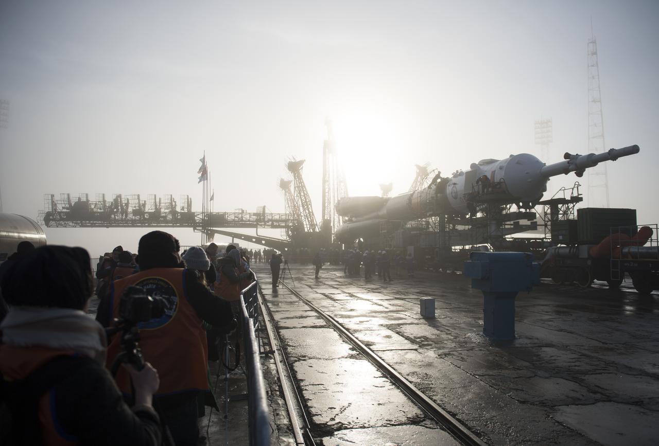 The Soyuz rocket is seen on the launch pad after being rolled out by train, Monday, March 19, 2018 at the Baikonur Cosmodrome in Kazakhstan. Expedition 55 crewmembers Ricky Arnold and Drew Feustel of NASA and Oleg Artemyev of Roscosmos are scheduled to launch at 1:44 p.m. Eastern time (11:44 p.m. Baikonur time) on March 21 and will spend the next five months living and working aboard the International Space Station.  Photo Credit: (NASA/Joel Kowsky)