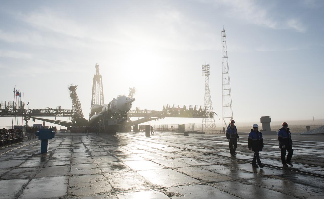 Workers prepare to raise the Soyuz rocket into a vertical position on the pad, Monday, March 19, 2018 at the Baikonur Cosmodrome in Kazakhstan. Expedition 55 crewmembers Ricky Arnold and Drew Feustel of NASA and Oleg Artemyev of Roscosmos are scheduled to launch at 1:44 p.m. Eastern time (11:44 p.m. Baikonur time) on March 21 and will spend the next five months living and working aboard the International Space Station. Photo Credit: (NASA/Joel Kowsky)
