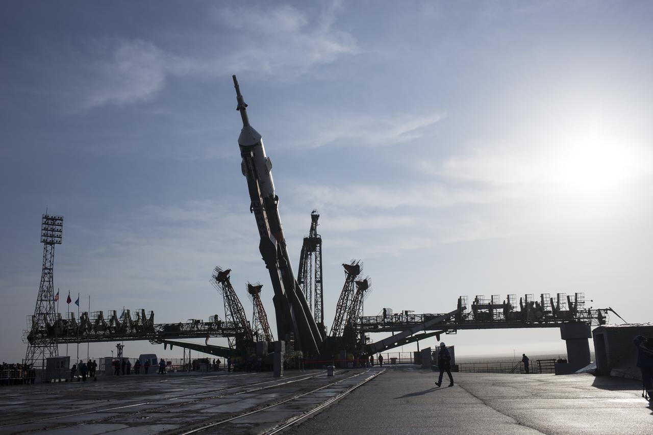 The Soyuz rocket is raised into a vertical position on the launch pad, Monday, March 19, 2018 at the Baikonur Cosmodrome in Kazakhstan. Expedition 55 crewmembers Ricky Arnold and Drew Feustel of NASA and Oleg Artemyev of Roscosmos are scheduled to launch at 1:44 p.m. Eastern time (11:44 p.m. Baikonur time) on March 21 and will spend the next five months living and working aboard the International Space Station.  Photo Credit: (NASA/Joel Kowsky)