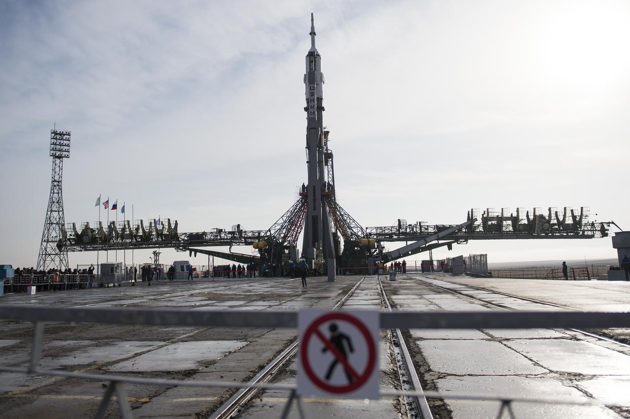 The Soyuz rocket is raised into a vertical position on the launch pad, Monday, March 19, 2018 at the Baikonur Cosmodrome in Kazakhstan. Expedition 55 crewmembers Ricky Arnold and Drew Feustel of NASA and Oleg Artemyev of Roscosmos are scheduled to launch at 1:44 p.m. Eastern time (11:44 p.m. Baikonur time) on March 21 and will spend the next five months living and working aboard the International Space Station.  Photo Credit: (NASA/Joel Kowsky)