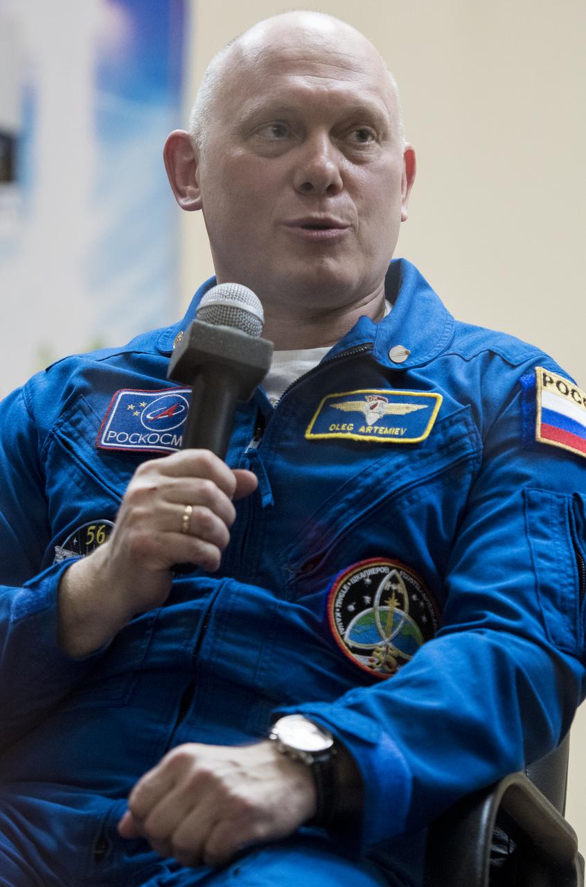 Expedition 55 Soyuz Commander Oleg Artemyev of Roscosmos answers a question during a press conference, Tuesday, March 20, 2018 a the Cosmonaut Hotel in Baikonur, Kazakhstan. Artemyev, flight engineer Ricky Arnold and flight engineer Drew Feustel of NASA are scheduled to launch to the International Space Station aboard the Soyuz MS-08 spacecraft on Wednesday, March, 21. Photo Credit: (NASA/Joel Kowsky)