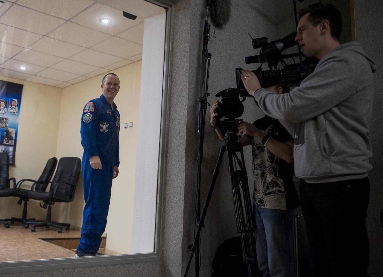 Expedition 55 flight engineer Ricky Arnold of NASA is seen at the conclusion of a press conference, Tuesday, March 20, 2018 a the Cosmonaut Hotel in Baikonur, Kazakhstan. Arnold, Soyuz Commander Oleg Artemyev of Roscosmos, and flight engineer Drew Feustel of NASA are scheduled to launch to the International Space Station aboard the Soyuz MS-08 spacecraft on Wednesday, March, 21.  Photo Credit: (NASA/Joel Kowsky)