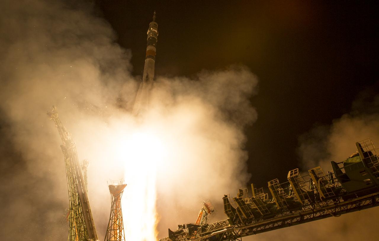 The Soyuz MS-08 rocket is launched with Expedition 55 Soyuz Commander Oleg Artemyev of Roscosmos and flight engineers Ricky Arnold and Drew Feustel of NASA, Wednesday, March 21, 2018 at the Baikonur Cosmodrome in Kazakhstan. Artemyev, Arnold, and Feustel will spend the next five months living and working aboard the International Space Station. Photo Credit: (NASA/Joel Kowsky)