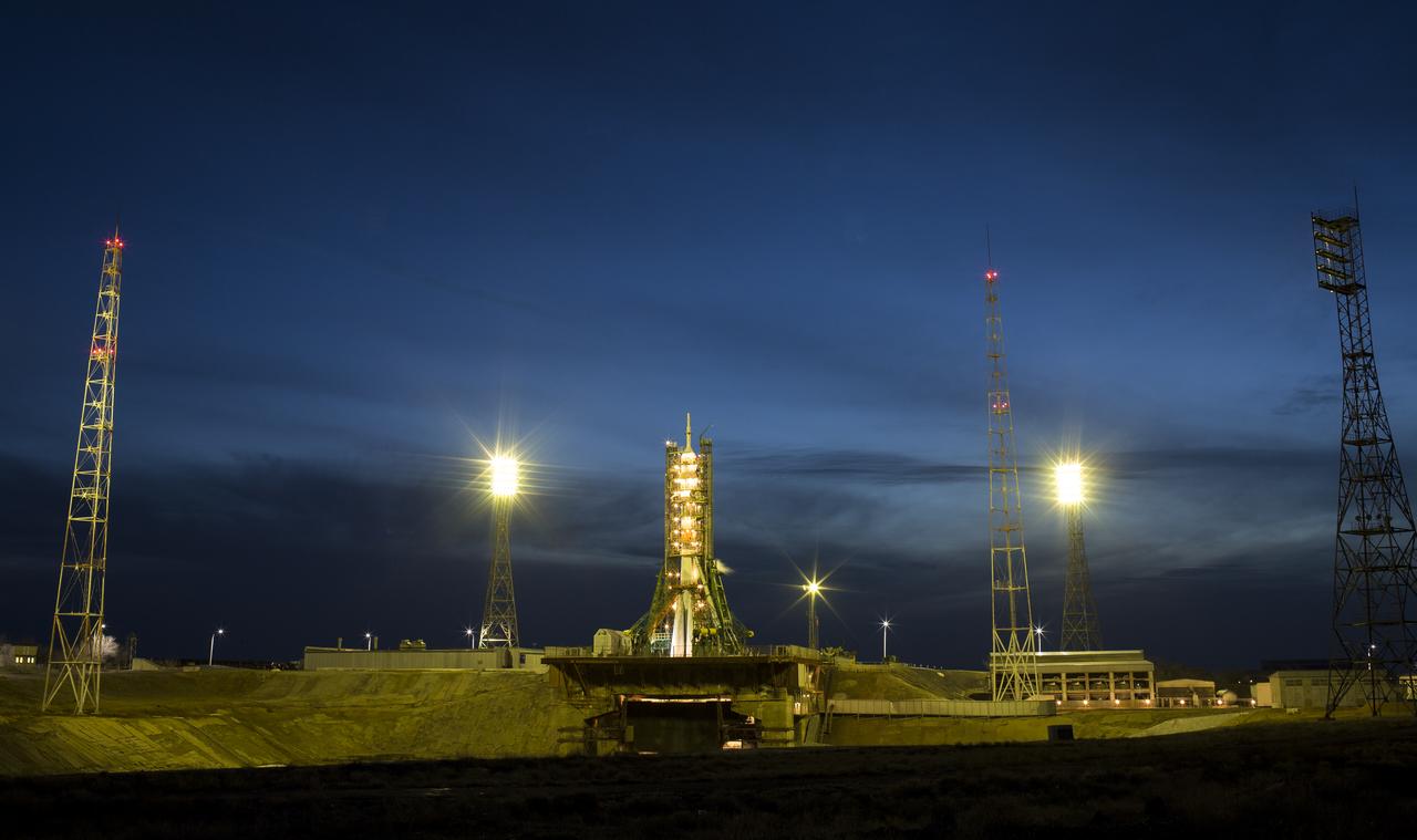 The Soyuz MS-08 rocket is seen on the launch pad hours before launch, Wednesday, March 21, 2018 at the Baikonur Cosmodrome in Kazakhstan. Expedition 55 Soyuz Commander Oleg Artemyev of Roscosmos and flight engineers Drew Feustel and Ricky Arnold of NASA launched at 1:44 p.m. Eastern time (11:44 p.m. Baikonur time) to begin a five month mission to the International Space Station. Photo Credit: (NASA/Joel Kowsky)