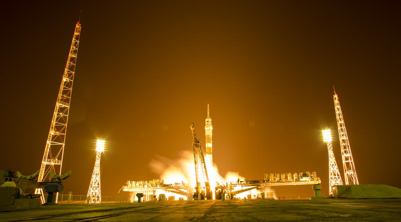 The Soyuz MS-08 rocket is launched with Expedition 55 Soyuz Commander Oleg Artemyev of Roscosmos and flight engineers Ricky Arnold and Drew Feustel of NASA, Wednesday, March 21, 2018 at the Baikonur Cosmodrome in Kazakhstan. Artemyev, Arnold, and Feustel will spend the next five months living and working aboard the International Space Station. Photo Credit: (NASA/Joel Kowsky)