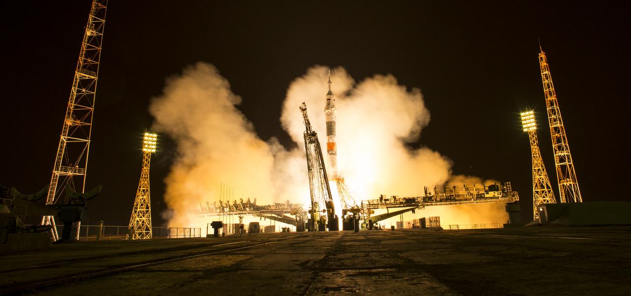 The Soyuz MS-08 rocket is launched with Expedition 55 Soyuz Commander Oleg Artemyev of Roscosmos and flight engineers Ricky Arnold and Drew Feustel of NASA, Wednesday, March 21, 2018 at the Baikonur Cosmodrome in Kazakhstan. Artemyev, Arnold, and Feustel will spend the next five months living and working aboard the International Space Station. Photo Credit: (NASA/Joel Kowsky)