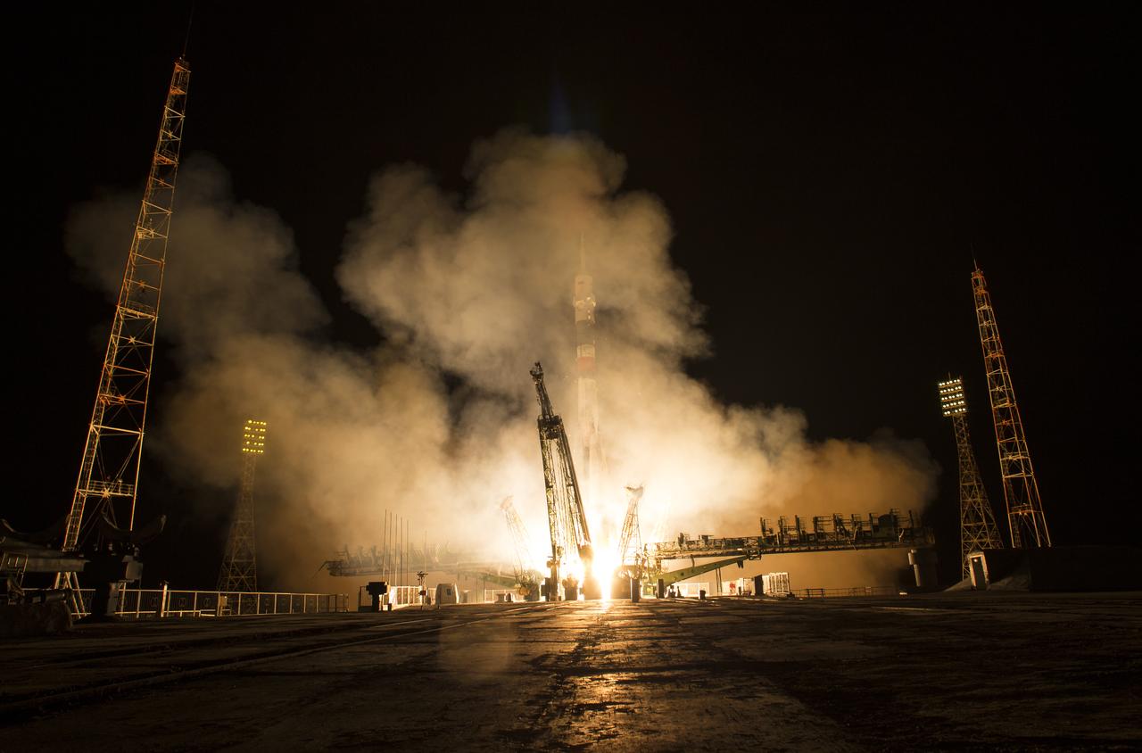 The Soyuz MS-08 rocket is launched with Expedition 55 Soyuz Commander Oleg Artemyev of Roscosmos and flight engineers Ricky Arnold and Drew Feustel of NASA, Wednesday, March 21, 2018 at the Baikonur Cosmodrome in Kazakhstan. Artemyev, Arnold, and Feustel will spend the next five months living and working aboard the International Space Station.  Photo Credit: (NASA/Joel Kowsky)
